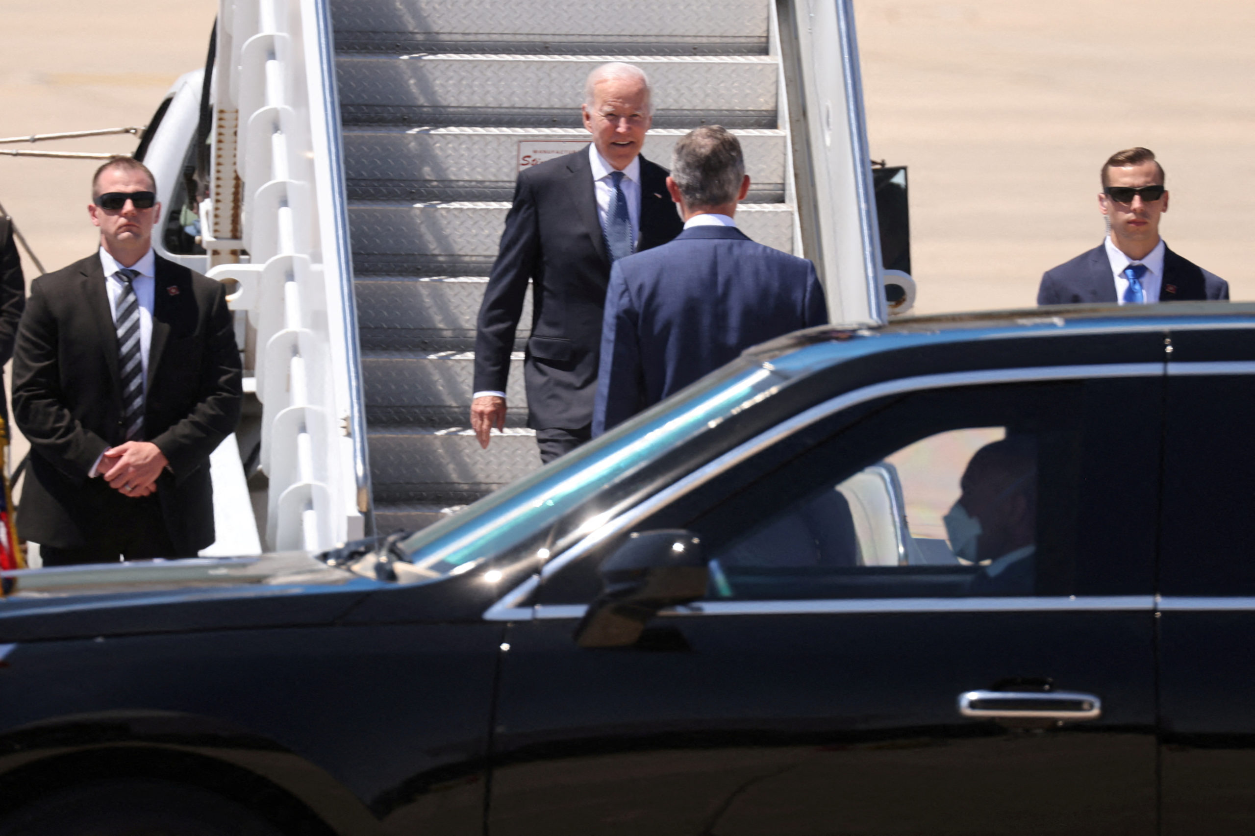 U.S. President Joe Biden disembarks Air Force One as he arrives at Torrejon de Ardoz airport, ahead of NATO summit, near Madrid, Spain June 28, 2022. REUTERS/Nacho Doce