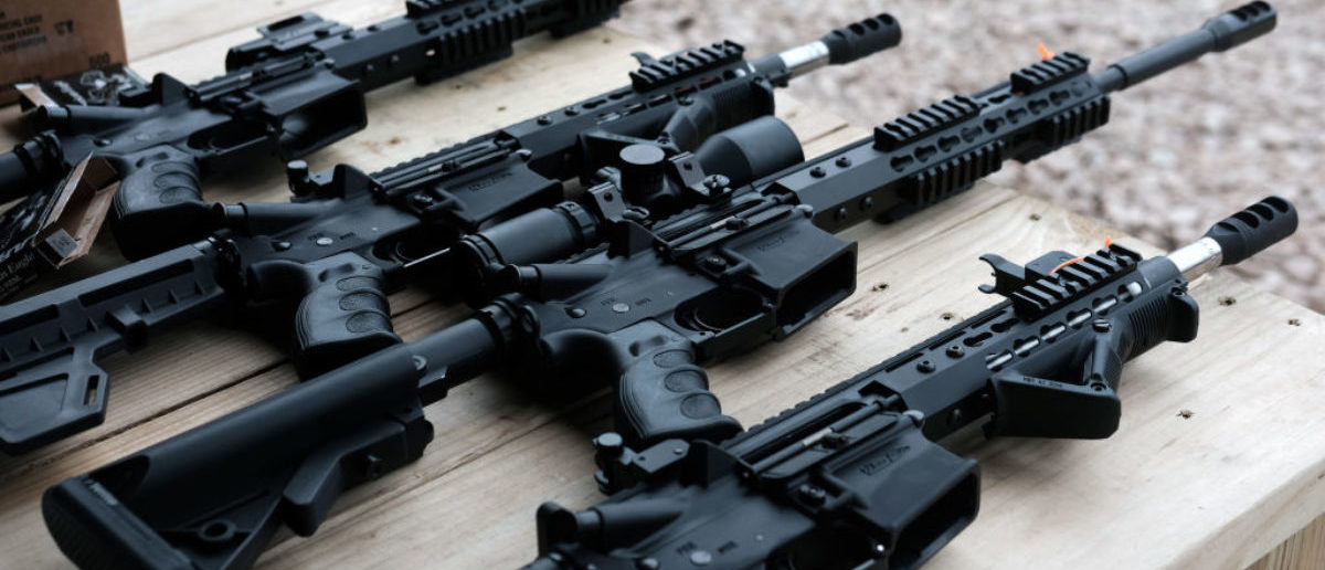 GREELEY, PENNSYLVANIA - OCTOBER 12: AR-15 rifles and other weapons are displayed on a table at a shooting range during the “Rod of Iron Freedom Festival” on October 12, 2019 in Greeley, Pennsylvania. The two-day event, which is organized by Kahr Arms/Tommy Gun Warehouse and Rod of Iron Ministries, has billed itself as a “second amendment rally and celebration of freedom, faith and family.” Numerous speakers, vendors and displays celebrated guns and gun culture in America. (Photo by Spencer Platt/Getty Images)