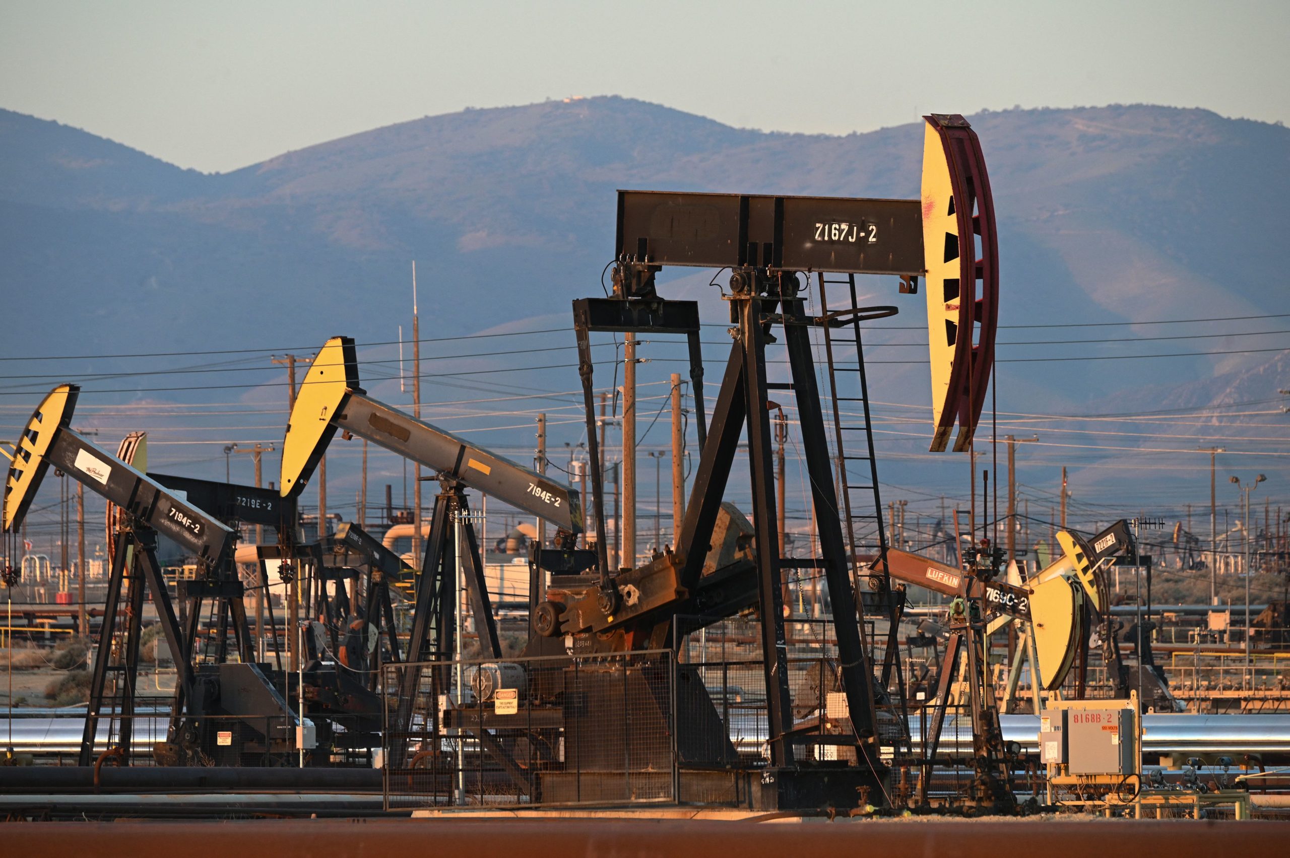 Active pump jacks increase pressure to draw oil toward the surface at the South Belridge Oil Field on Feb. 26 in Kern County, California. (Robyn Beck/AFP via Getty Images)