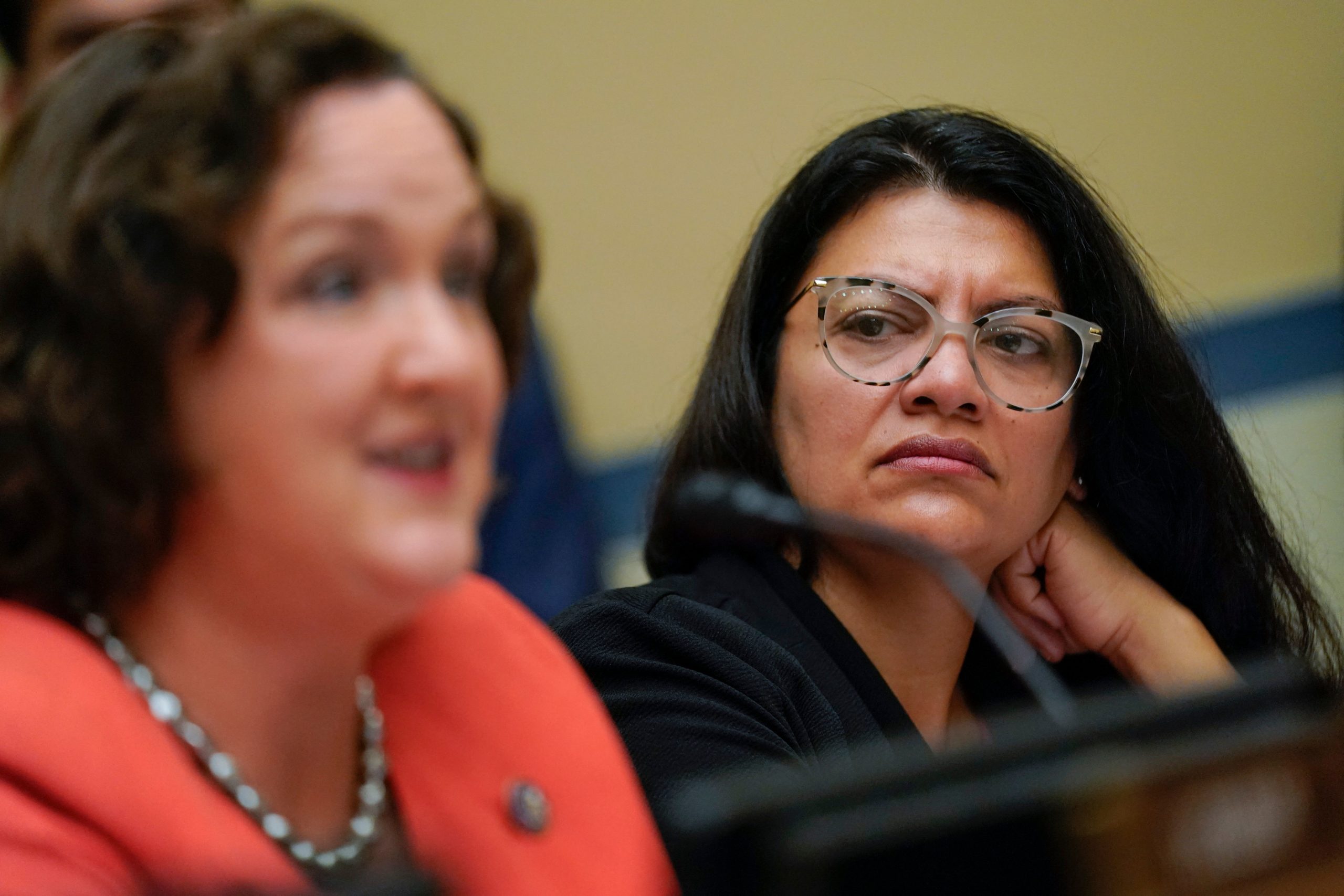 Rep. Rashida Tlaib, D-Mich., right, listens as Rep. Katie Porter, D-Calif., left, speaks during a House Committee on Oversight and Reform hearing on gun violence on Capitol Hill in Washington, DC, June 8, 2022. (Photo by Andrew Harnik / POOL / AFP) (Photo by ANDREW HARNIK/POOL/AFP via Getty Images)