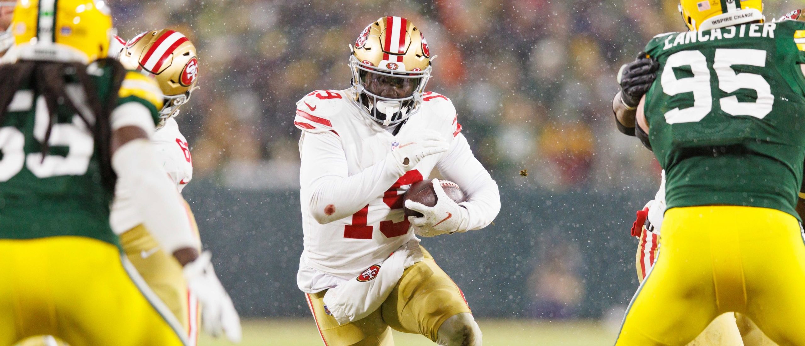 Green Bay, Wisconsin, USA. 22nd Jan, 2022. San Francisco 49ers wide  receiver Deebo Samuel (19) with the saying 'It takes all of us' on his  helmet during the NFL divisional playoff football