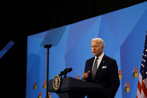 FILE PHOTO: U.S. President Joe Biden speaks at a news conference during a NATO summit in Madrid, Spain June 30, 2022. REUTERS/Violeta Santos Moura/File Photo