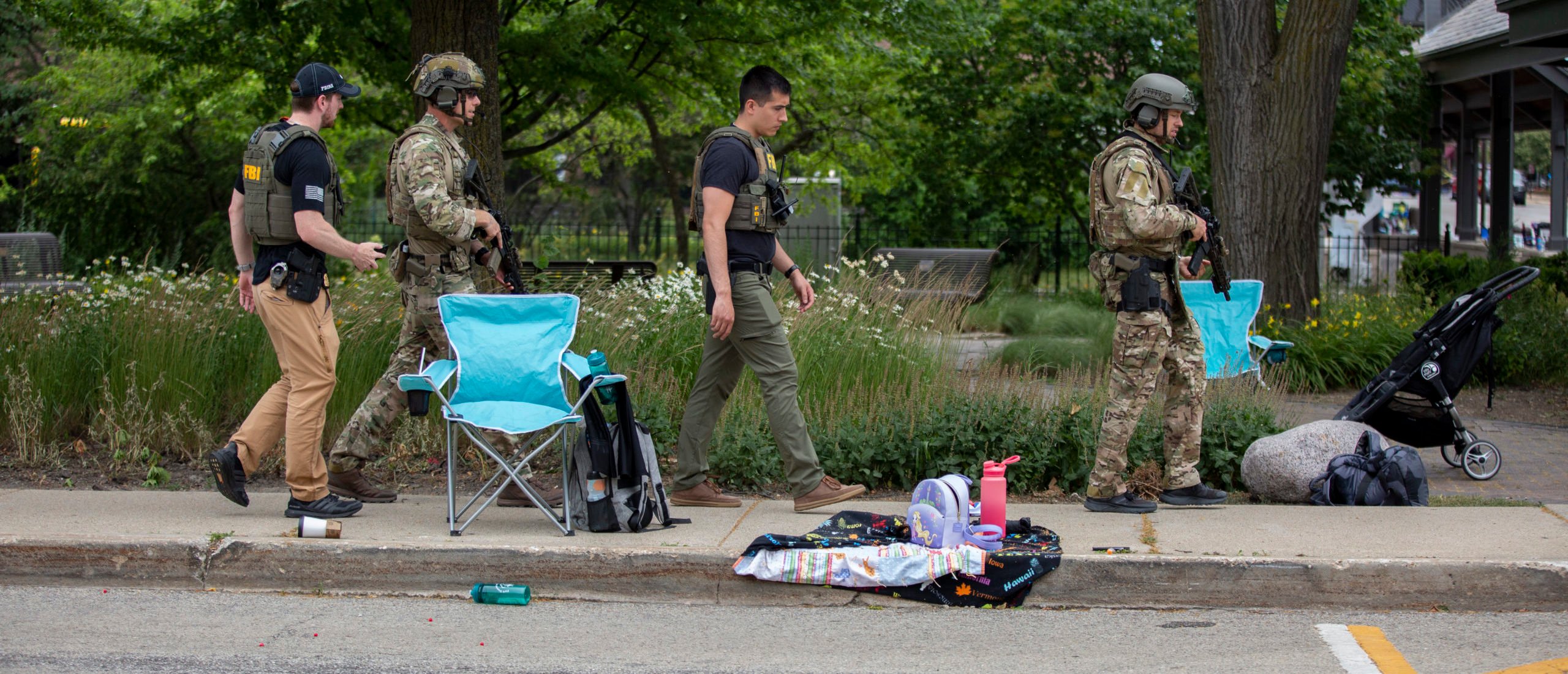 Police Detain Person Of Interest In Deadly Parade Shooting