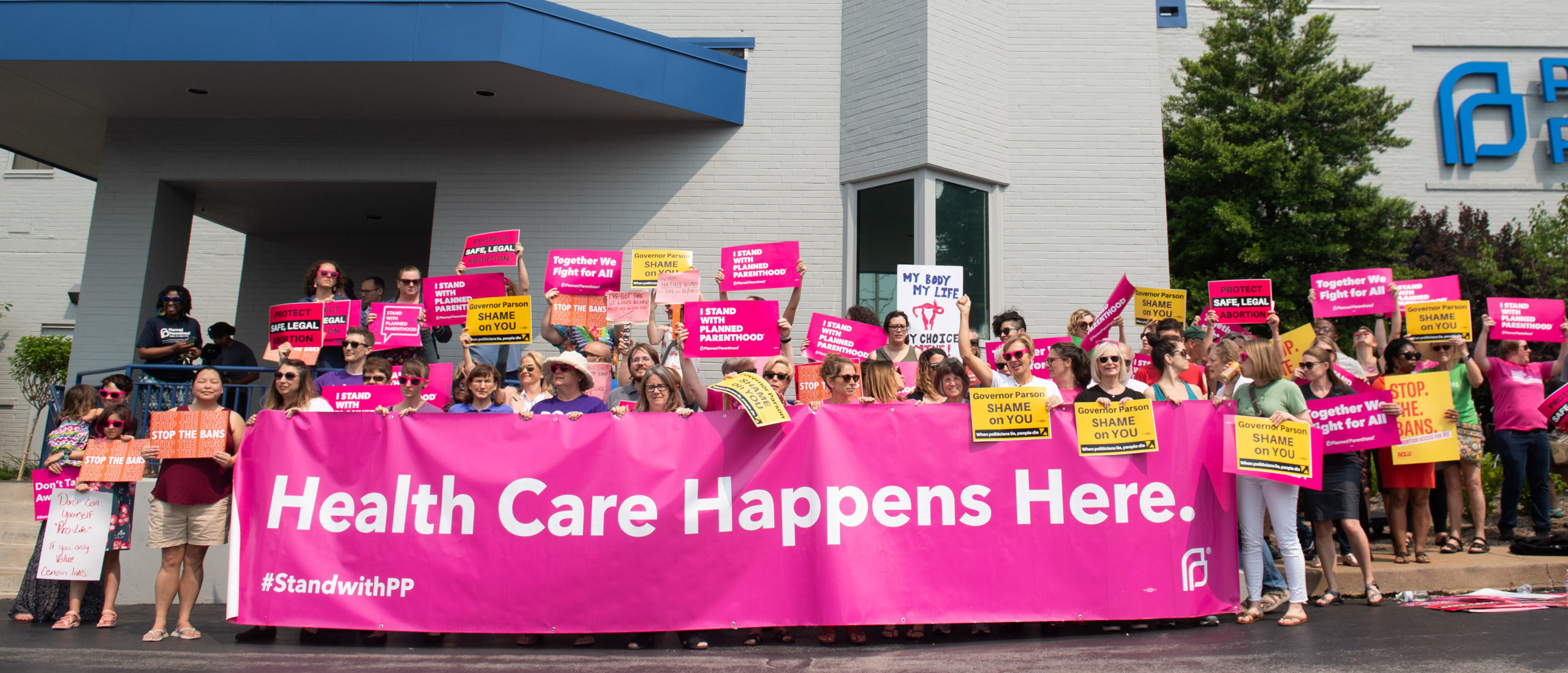 Pro-choice supporters and staff of Planned Parenthood hold a rally outside the Planned Parenthood Reproductive Health Services Center in St. Louis, Missouri, May 31, 2019, the last location in the state performing abortions. - A US Court on May 31, 2019 blocked Missouri from closing the clinic. 