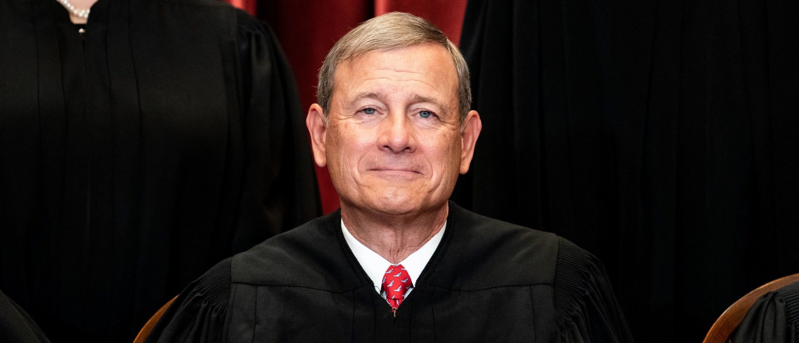 Chief Justice John Roberts sits during a group photo of the Justices at the Supreme Court in Washington, DC on April 23, 2021. (Photo by Erin Schaff / POOL / AFP) (Photo by ERIN SCHAFF/POOL/AFP via Getty Images)