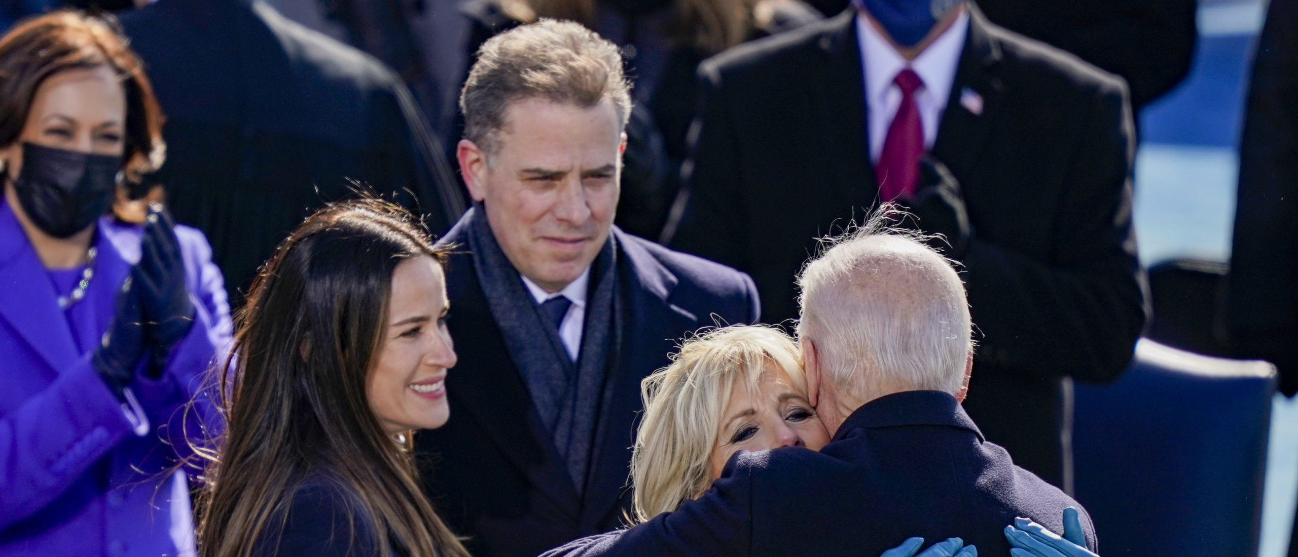 WASHINGTON, DC - JANUARY 20: U.S. President Joe Biden embraces his family First Lady Dr. Jill Biden, son Hunter Biden and daughter Ashley after being sworn in during his inauguation on the West Front of the U.S. Capitol on January 20, 2021 in Washington, DC. During today's inauguration ceremony Joe Biden becomes the 46th president of the United States. (Photo by Drew Angerer/Getty Images)