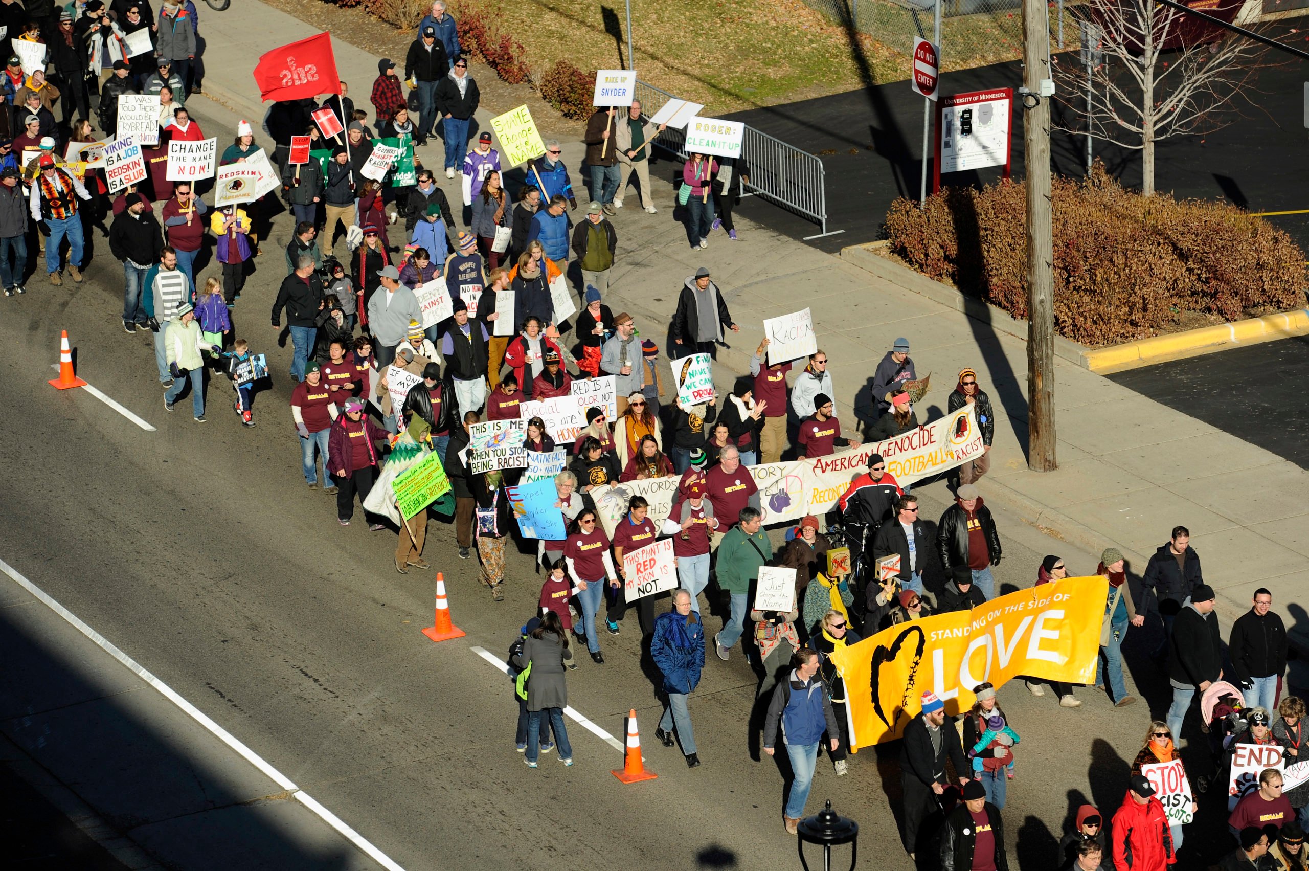 People march to TCF Bank Stadium to protest against the mascot for the Washington Redskins before the game against the Minnesota Vikings on November 2, 2014 in Minneapolis, Minnesota. Opponents of the Redskins name believe it's a slur that mocks Native American culture and they want the team to change it. (Photo by Hannah Foslien/Getty Images)
