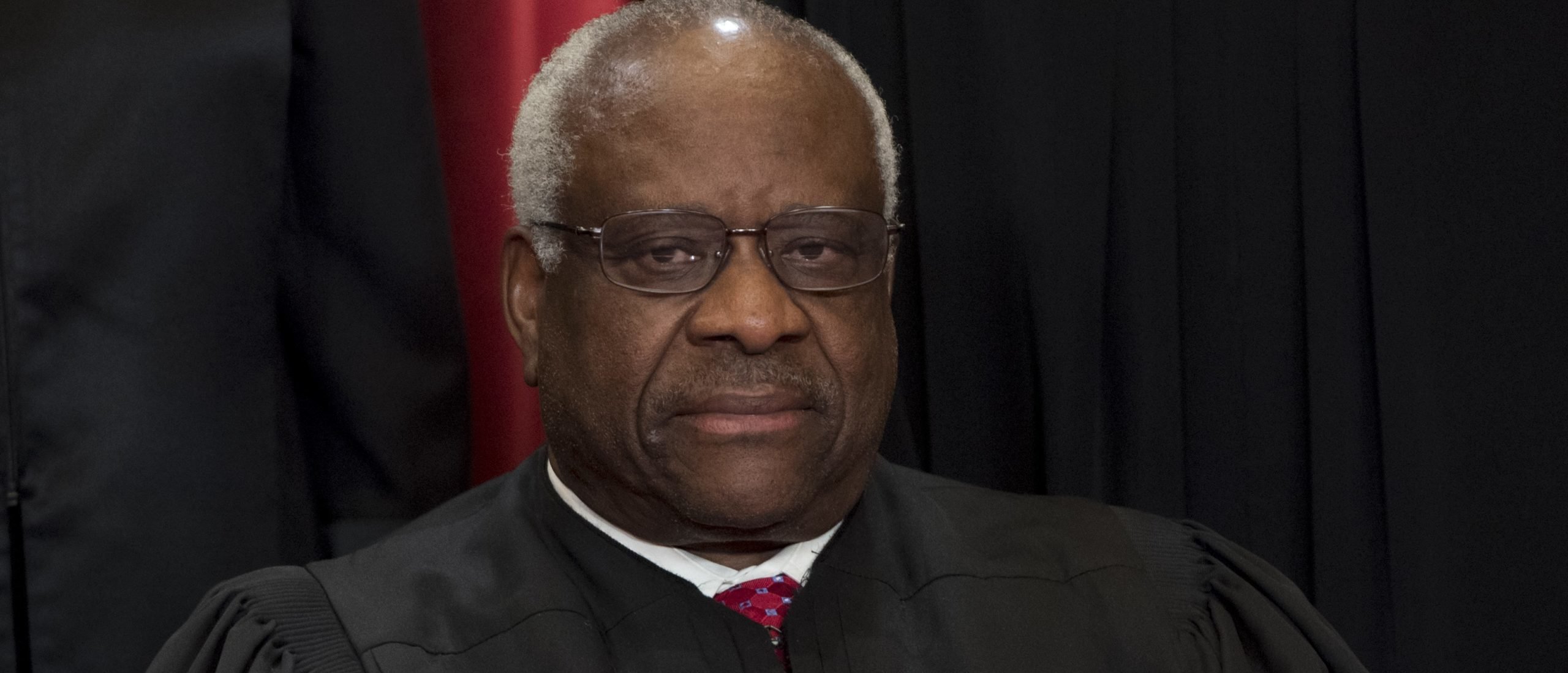 US Supreme Court Associate Justice Clarence Thomas sits for an official photo with other members of the US Supreme Court in the Supreme Court in Washington, DC, June 1, 2017. (Photo by SAUL LOEB/AFP via Getty Images)