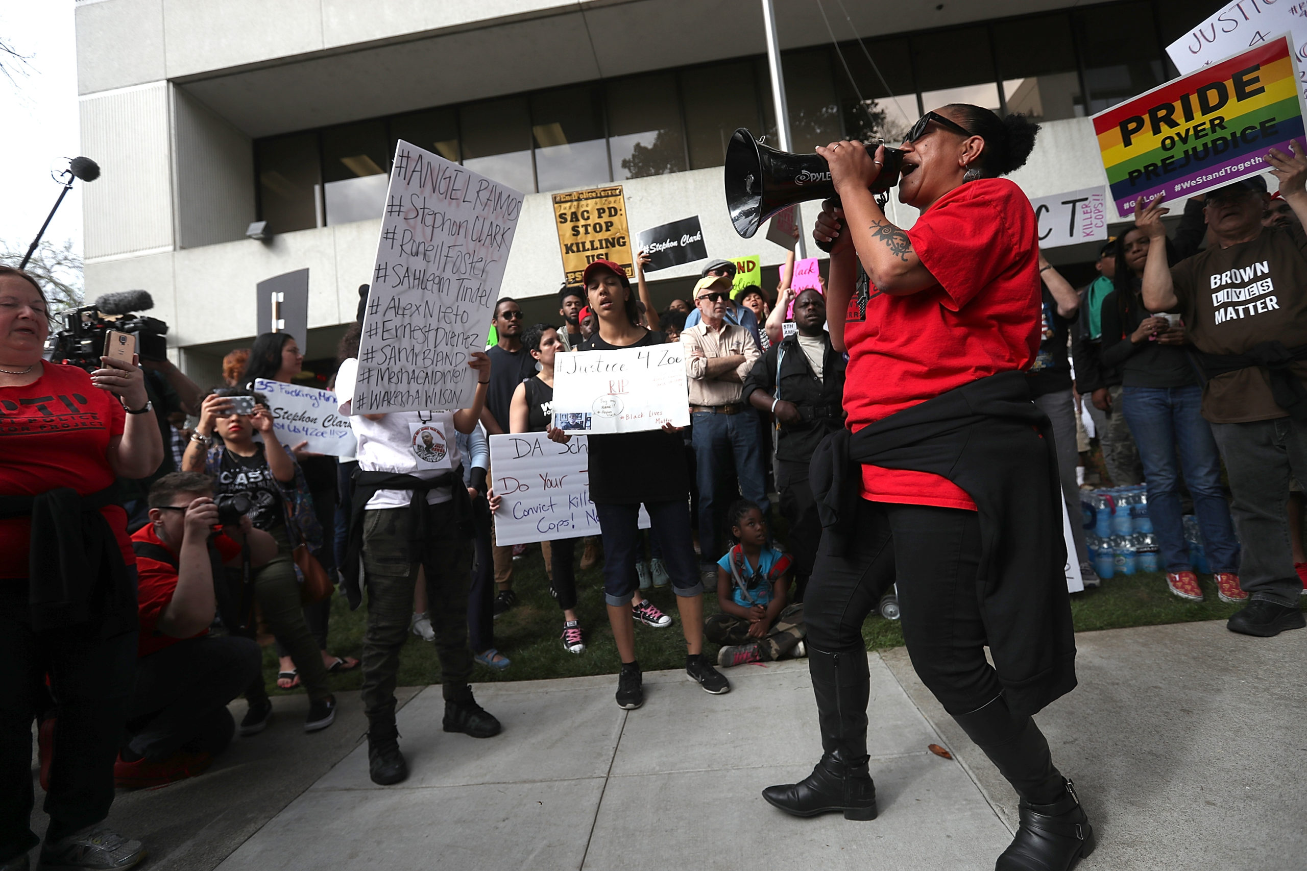 Black Lives Matter protesters stage a demonstration in front of the offices of Sacramento district attorney Anne Marie Schubert on April 4, 2018 in Sacramento, California. Over 100 Black Lives Matter protesters rallied during a day of action outside of the Sacramento district attorney office demanding justice for Stephon Clark, an unarmed black man who was shot and killed by Sacramento police on March 18. (Photo by Justin Sullivan/Getty Images)