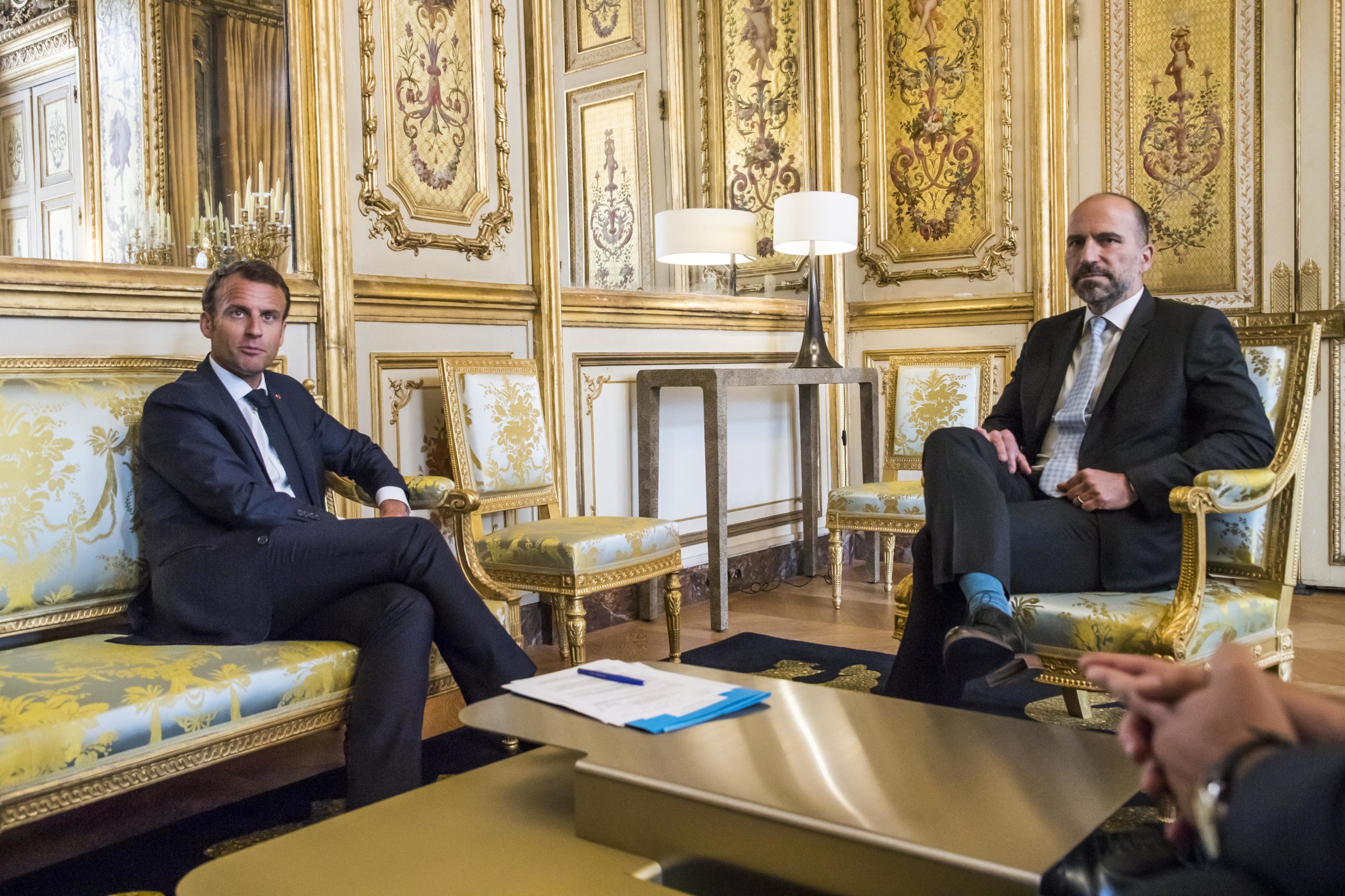 French President Emmanuel Macron (L) meets with Uber CEO Dara Khosrowshahi at the Elysee Palace in Paris, on May 23, 2018. (Photo by Christophe Petit-Tesson/AFP via Getty Images)
