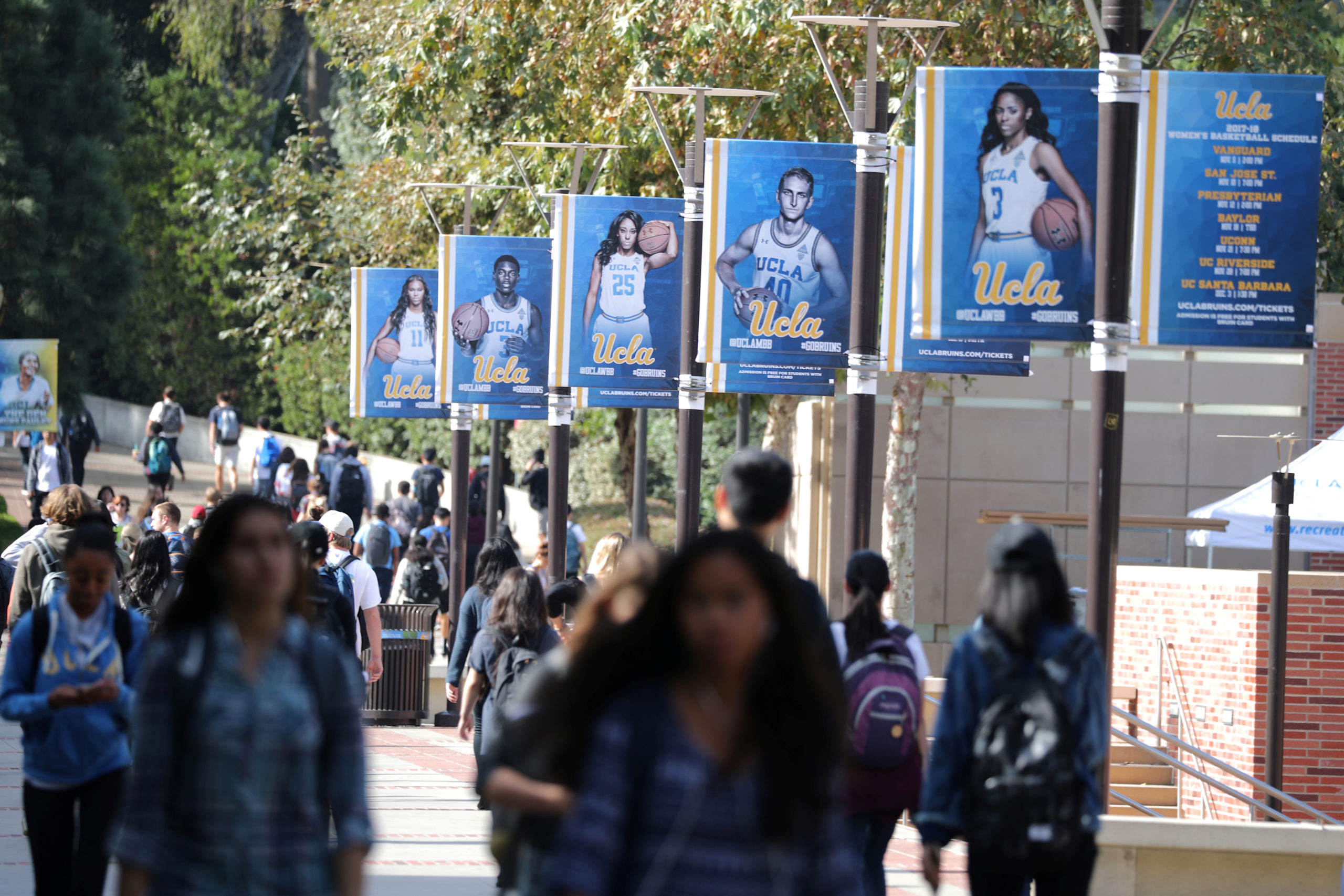 University of California Los Angeles (UCLA) students walk on the UCLA campus in Los Angeles, California, U.S. November 15, 2017. REUTERS/Lucy Nicholson