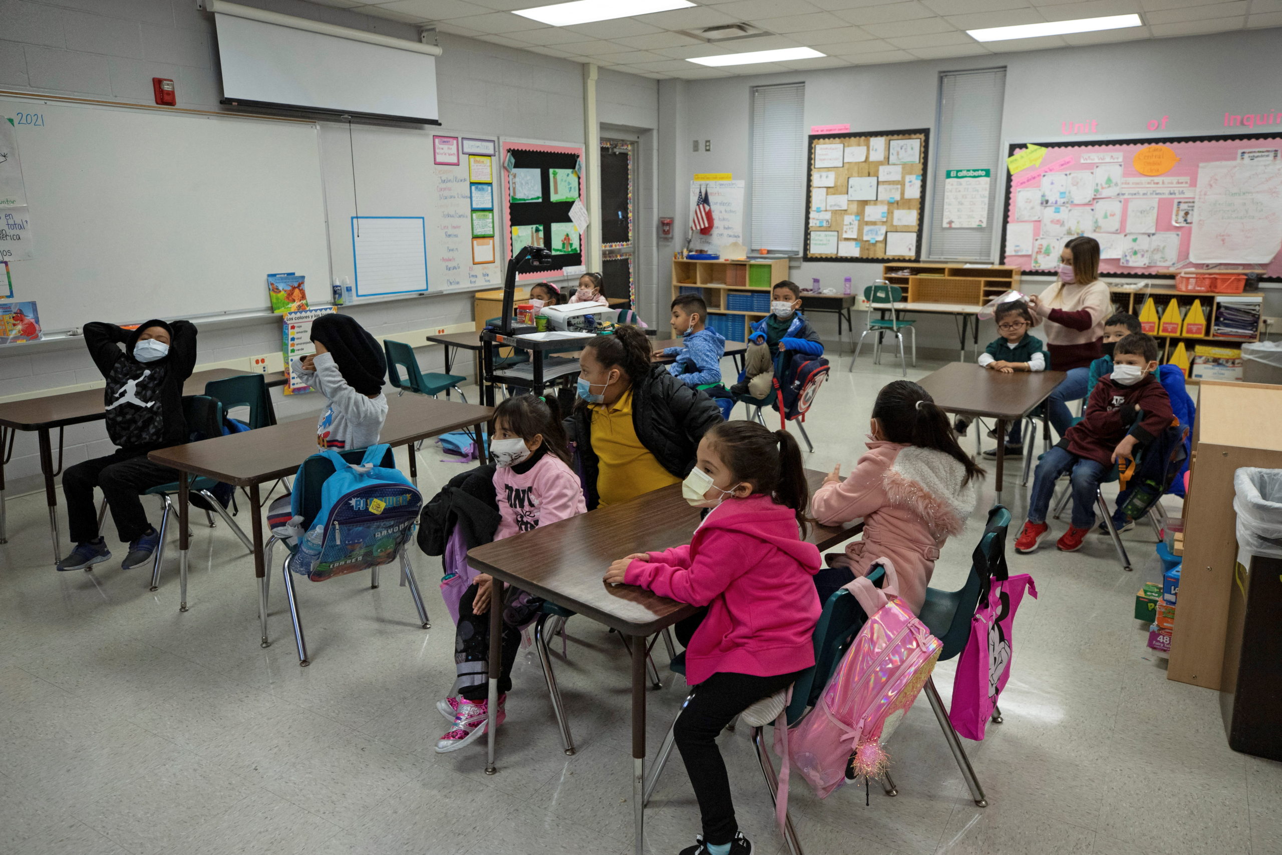 Students sit in the classroom, as returning to schools with coronavirus disease (COVID-19) prevention measures began, in San Antonio, Texas, U.S., January 11, 2022. REUTERS/Kaylee Greenlee Beal