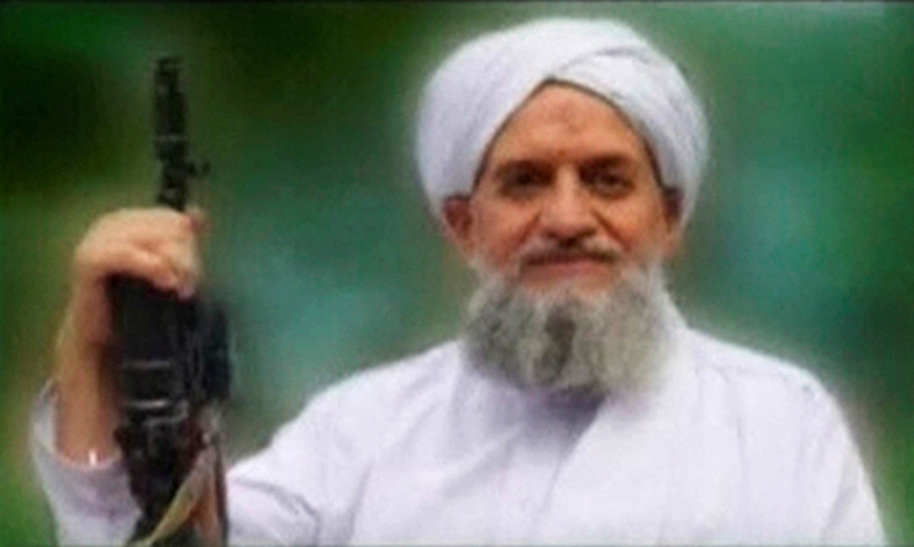 FILE PHOTO: A photo of Al Qaeda's new leader, Egyptian Ayman al-Zawahiri, is seen in this still image taken from a video released on September 12, 2011. SITE Monitoring Service/Handout via REUTERS TV/File Photo THIS IMAGE HAS BEEN SUPPLIED BY A THIRD PARTY.