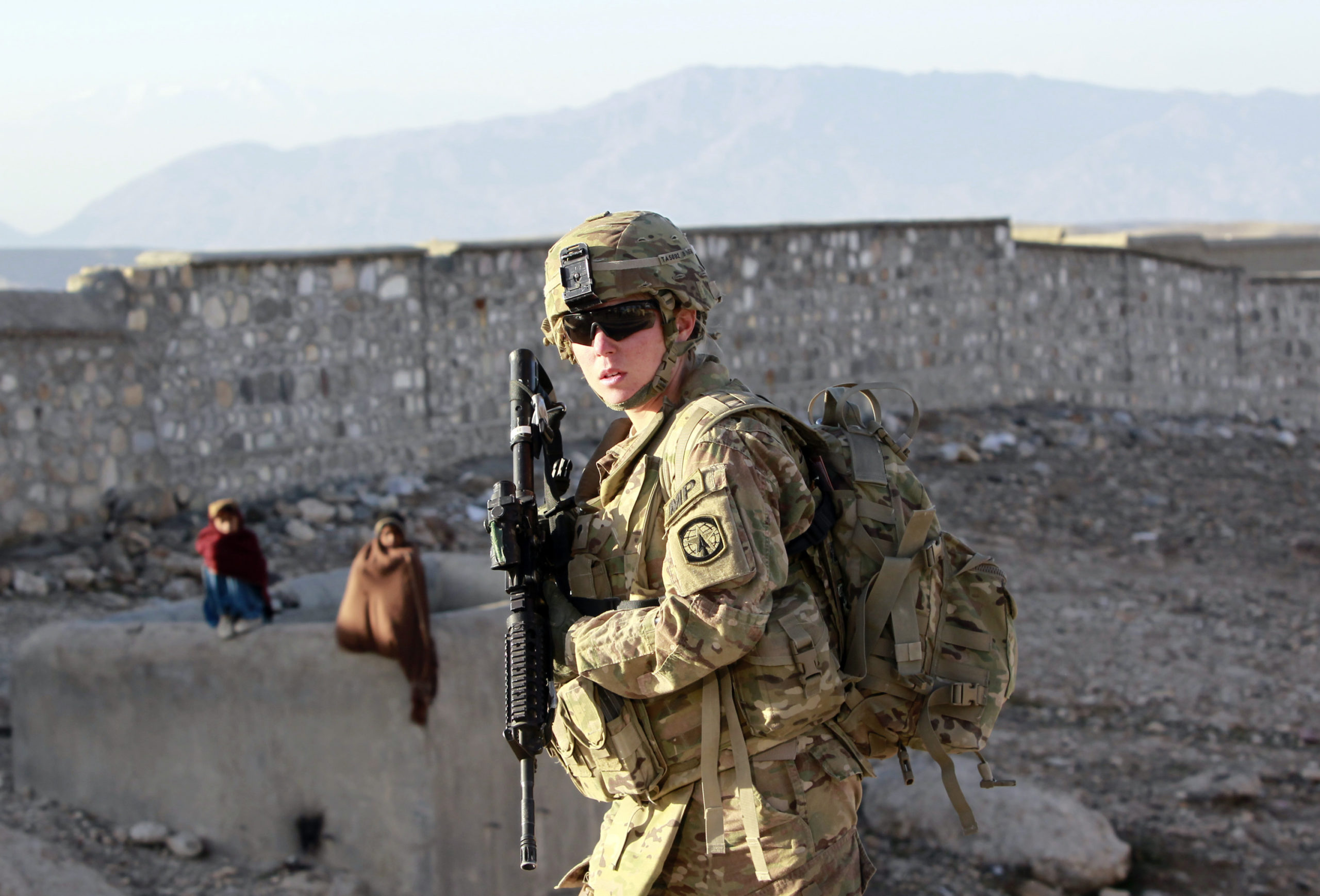 SPC Erica Taliaferro, a U.S. female soldier from 549th MP Company, Task Force Bronco patrols in Pachir wa Agam district in Nangarhar province, eastern Afghanistan March 5, 2012. REUTERS/Erik De Castro
