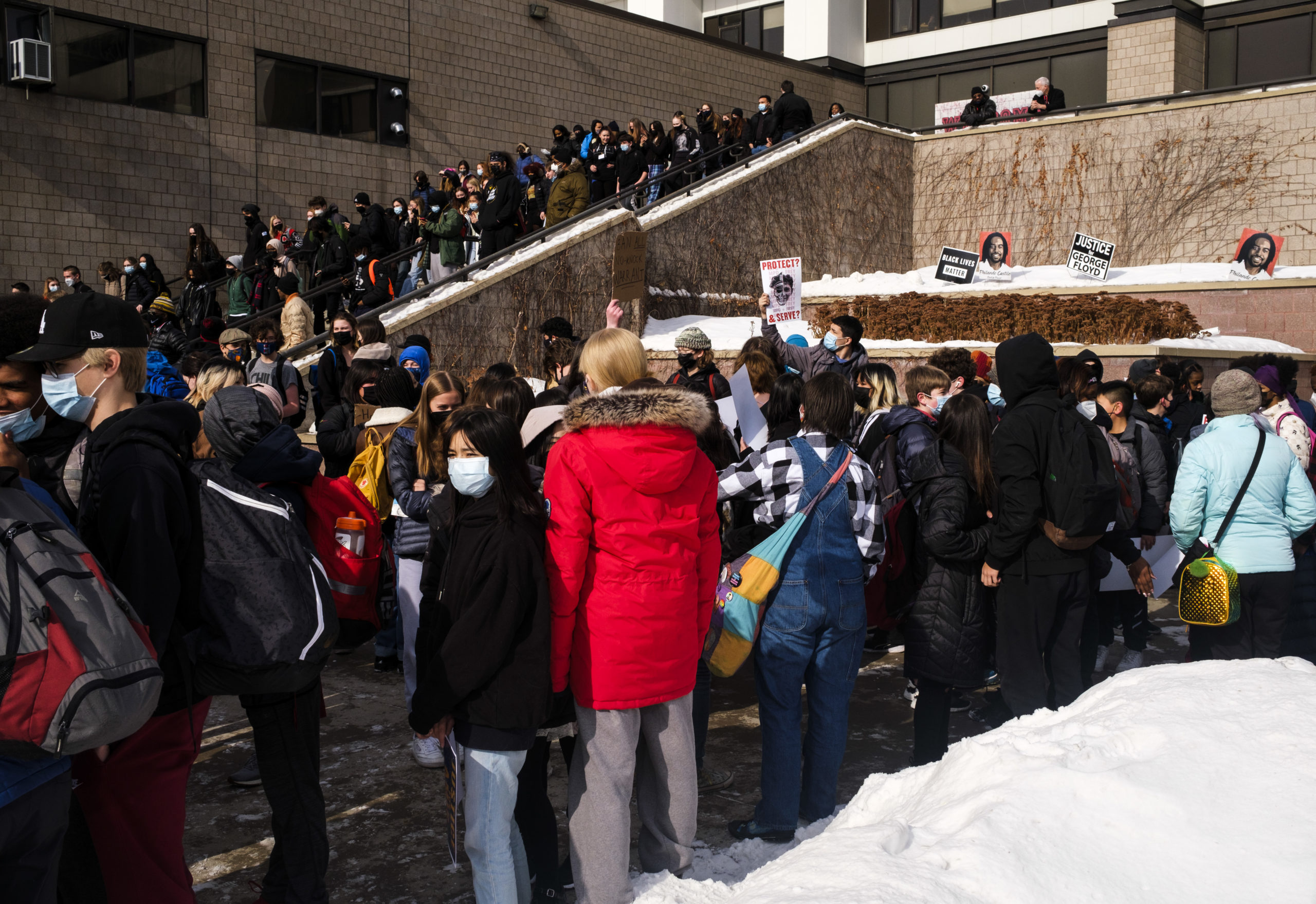 Students rally outside of St. Paul Central high school as they stage a walkout to protest the killing of Amir Locke last week on February 8, 2022 in St Paul, Minnesota. Locke, 22, was shot and killed by Minneapolis Police during a no-knock raid in which Locke was not the target of a warrant. (Photo by Stephen Maturen/Getty Images)