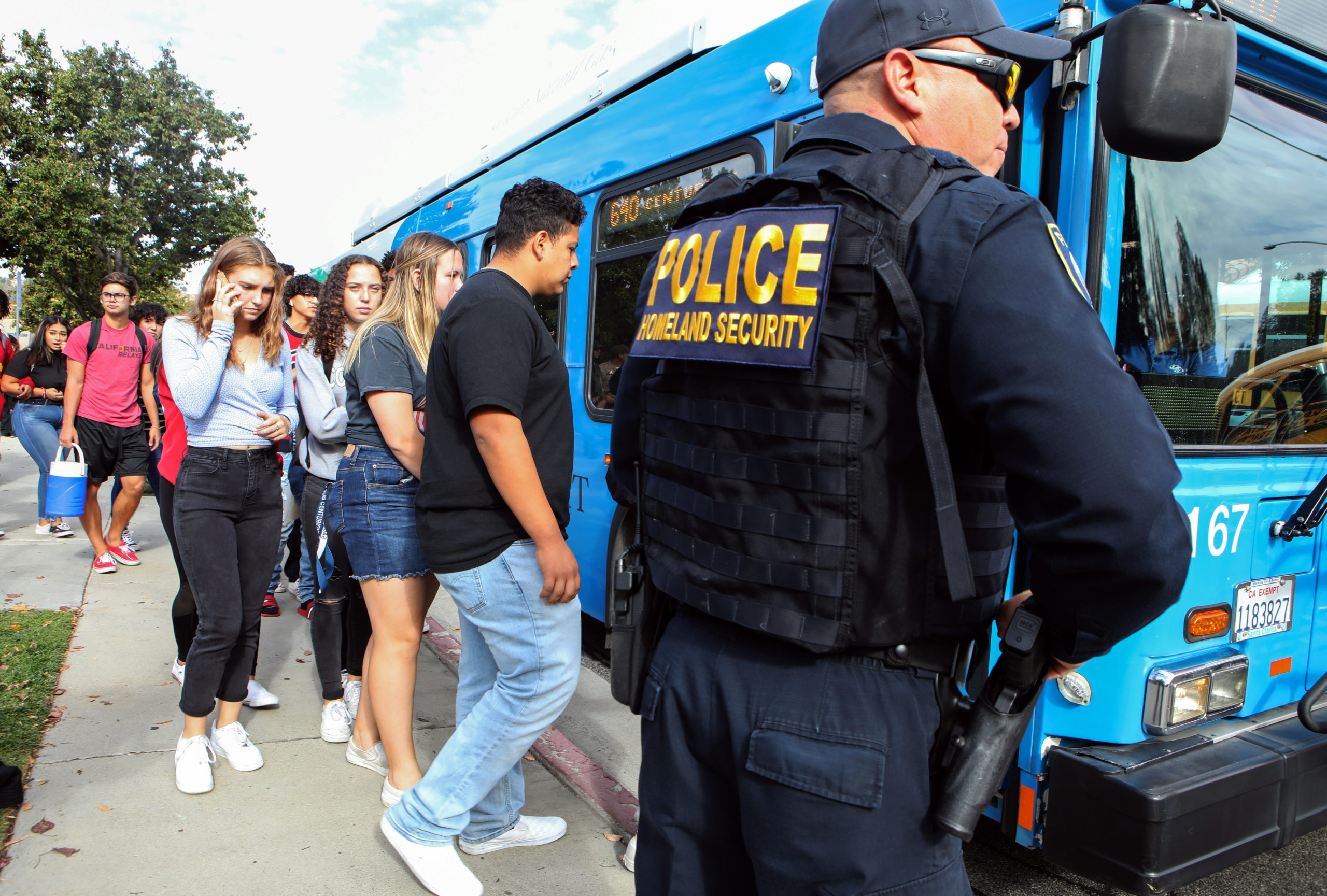 Students are evacuated from Saugus High School onto a bus after a shooting at the school left two students dead and three wounded on November 14, 2019 in Santa Clarita, California. A suspect in the shooting is being treated at a local hospital for a gunshot wound to the head. (Photo by Mario Tama/Getty Images)
