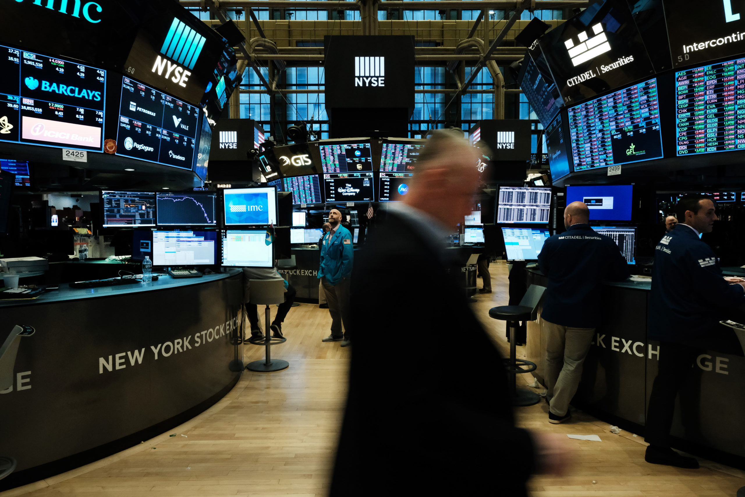 NEW YORK, NEW YORK - MARCH 20: Traders work on the floor of the New York Stock Exchange (NYSE) on March 20, 2020 in New York City. Trading on the floor will temporarily become fully electronic starting on Monday to protect employees from spreading the coronavirus. The Dow fell over 500 points on Friday as investors continue to show concerns over COVID-19. (Photo by Spencer Platt/Getty Images)