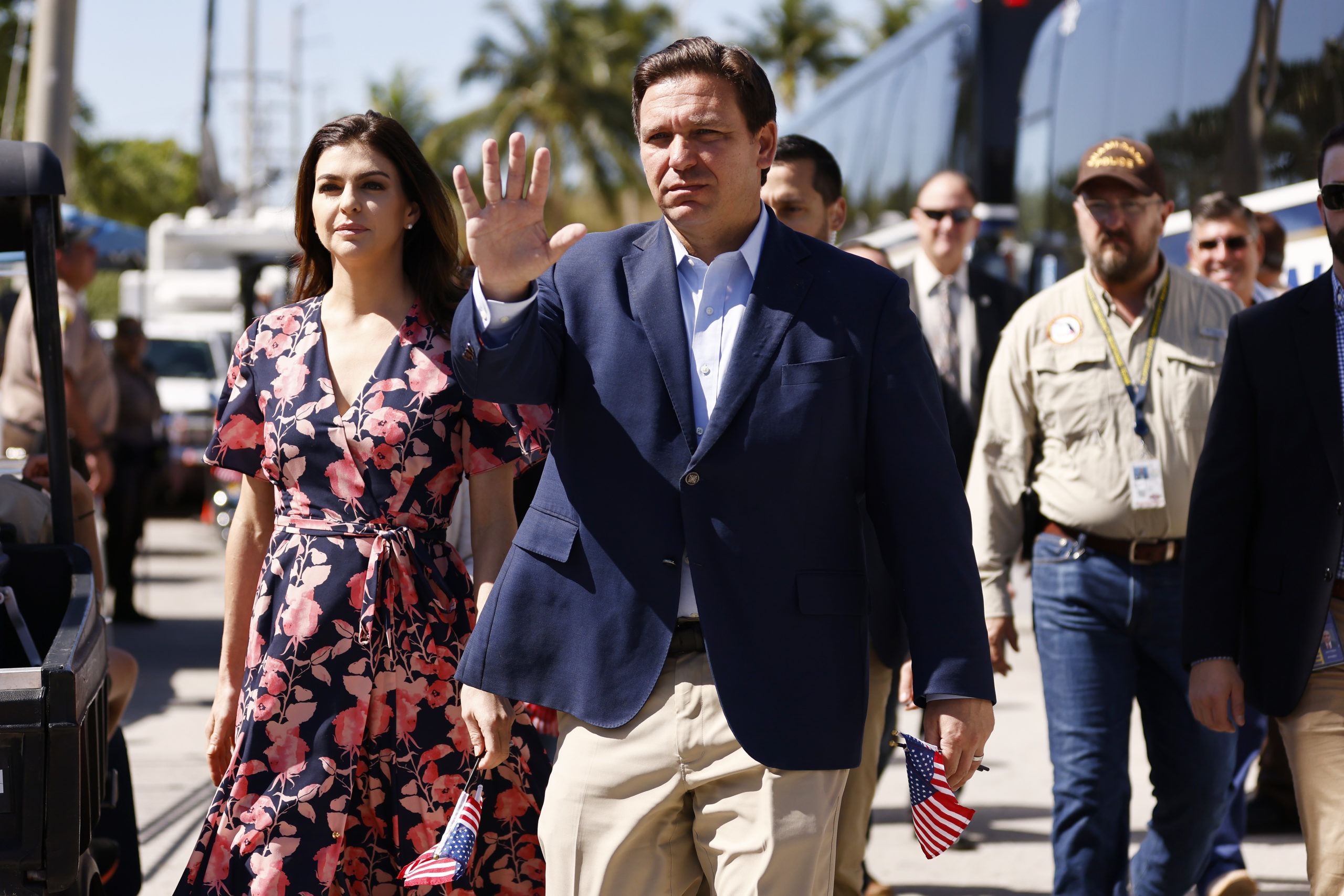 SURFSIDE, FLORIDA - JULY 03: Florida Gov. Ron DeSantis and his wife, Casey, arrive to visit a memorial to those missing outside the 12-story Champlain Towers South condo building that partially collapsed on July 03, 2021 in Surfside, Florida. Over one hundred people are being reported as missing as the search-and-rescue effort continues. (Photo by Michael Reaves/Getty Images)