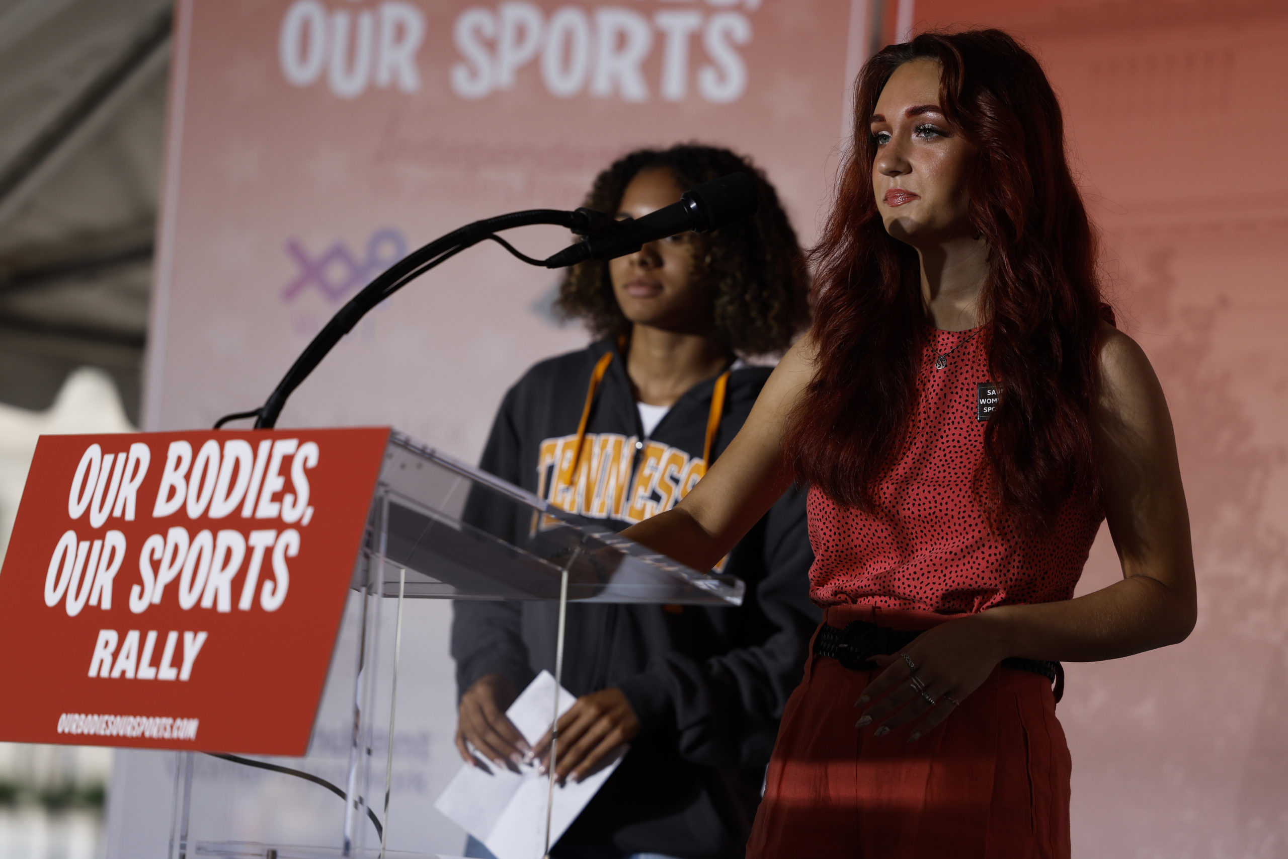 Selina Soule and Alanna Smith, two former Connecticut high school track athletes, speak during an "Our Bodies, Our Sports" rally for the 50th anniversary of Title IX at Freedom Plaza on June 23, 2022 in Washington, DC. The rally, organized by multiple athletic women's groups, was held to call on U.S. President Joe Biden to put restrictions on transgender females and "advocate to keep women's sports female". (Photo by Anna Moneymaker/Getty Images)