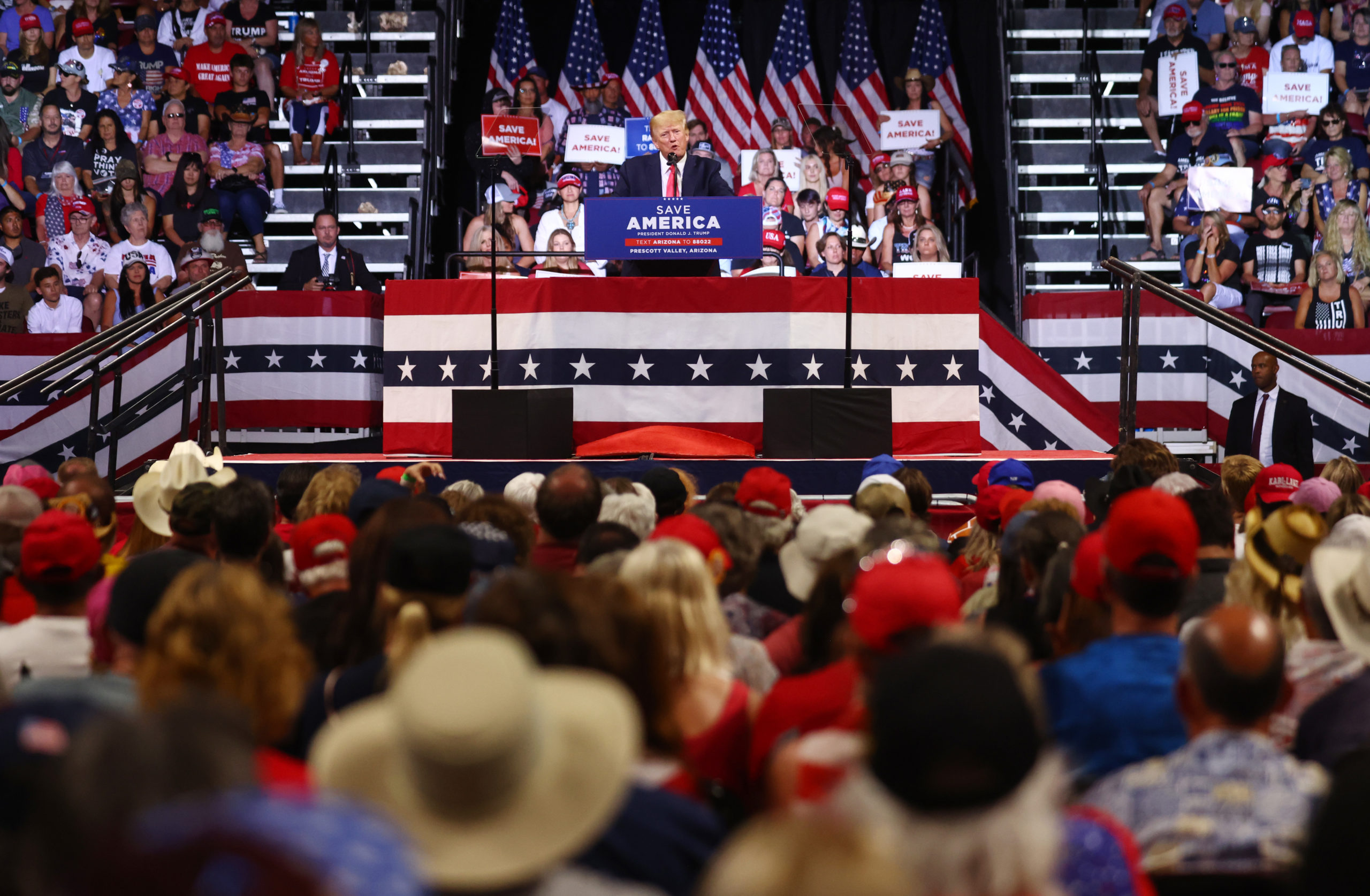 PRESCOTT VALLEY, ARIZONA - JULY 22: Former President Donald Trump (C) speaks to the crowd at a ‘Save America’ rally in support of Arizona GOP candidates on July 22, 2022 in Prescott Valley, Arizona. Arizona's primary election will take place August 2. (Photo by Mario Tama/Getty Images)