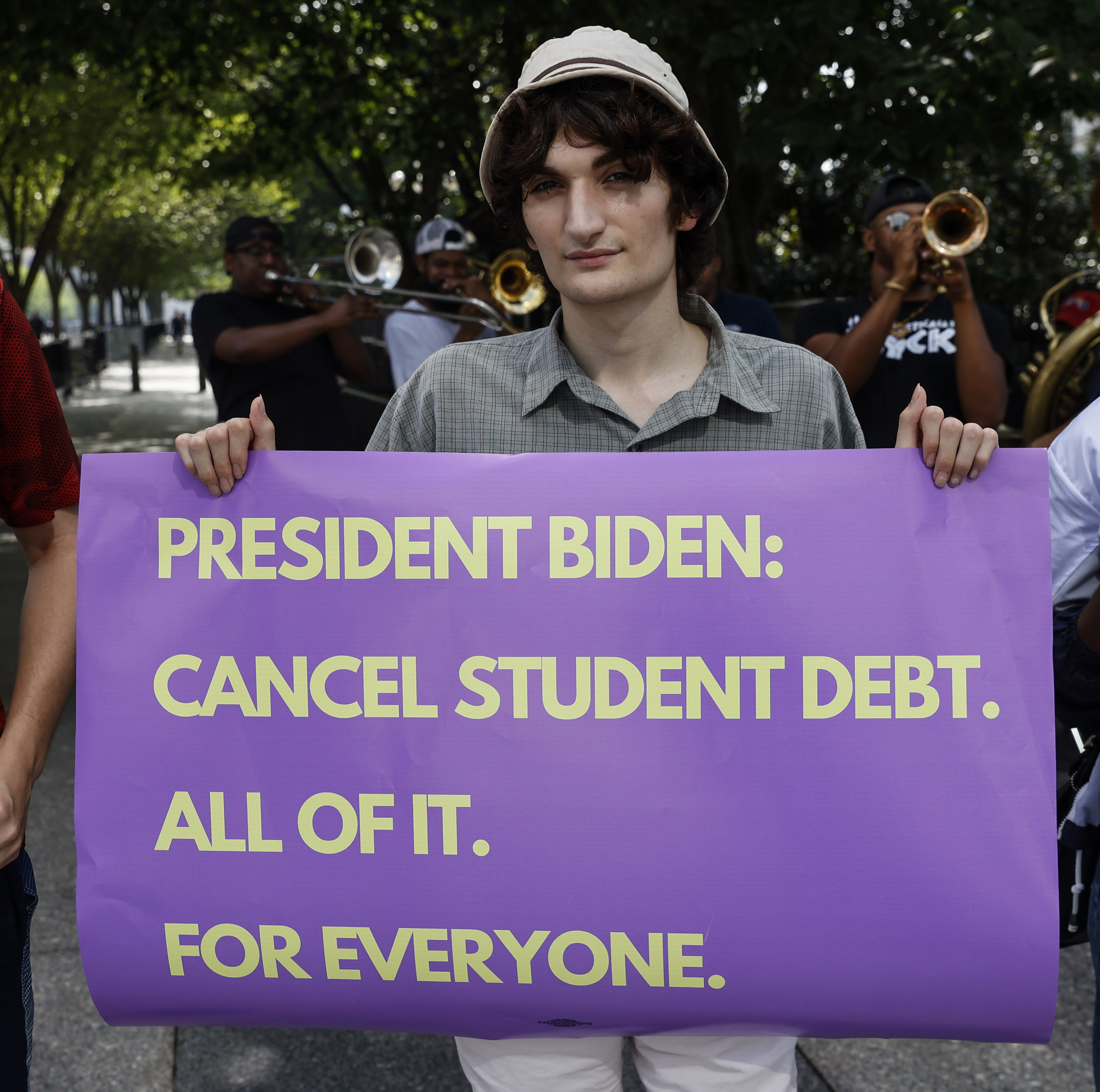 Student loan debt holders take part in a demonstration outside of the white house staff entrance to demand that President Biden cancel student loan debt in August on July 27, 2022 at the Executive Offices in Washington, DC. (Photo by Jemal Countess/Getty Images for We, The 45 Million)