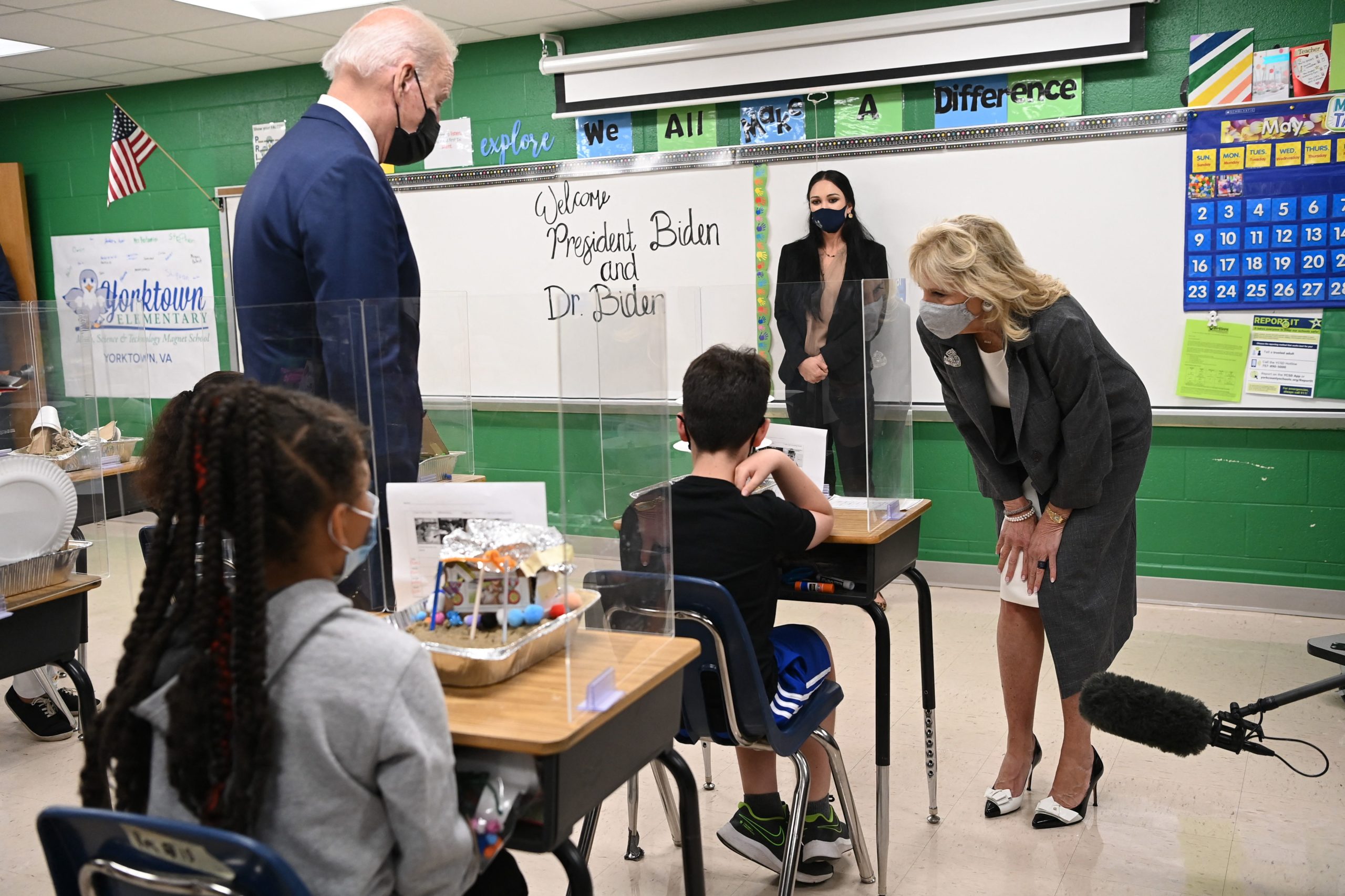 US President Joe Biden(L) and First Lady Jill Biden(R) visit the classroom of fifth-grade teacher Cindy Bertamini, at Yorktown Elementary School in Yorktown, Virginia on May 3, 2021. (Photo by MANDEL NGAN / AFP) (Photo by MANDEL NGAN/AFP via Getty Images)