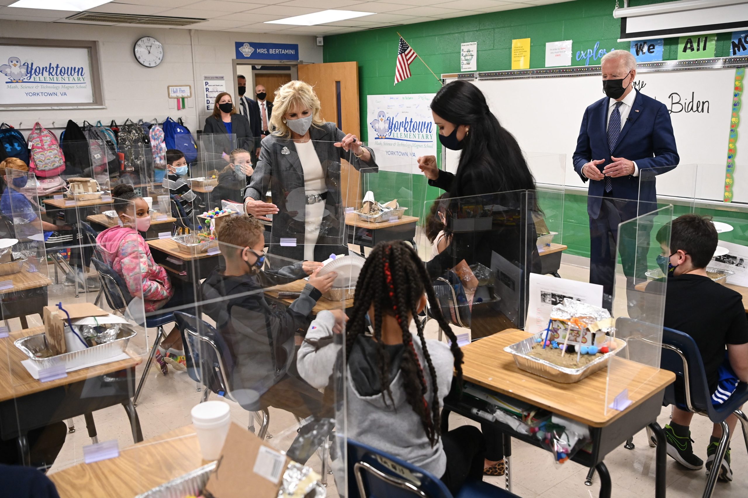 US President Joe Biden(R) and First Lady Jill Biden(L) visit the classroom of fifth-grade teacher Cindy Bertamini, at Yorktown Elementary School in Yorktown, Virginia on May 3, 2021. (Photo by MANDEL NGAN / AFP) (Photo by MANDEL NGAN/AFP via Getty Images)