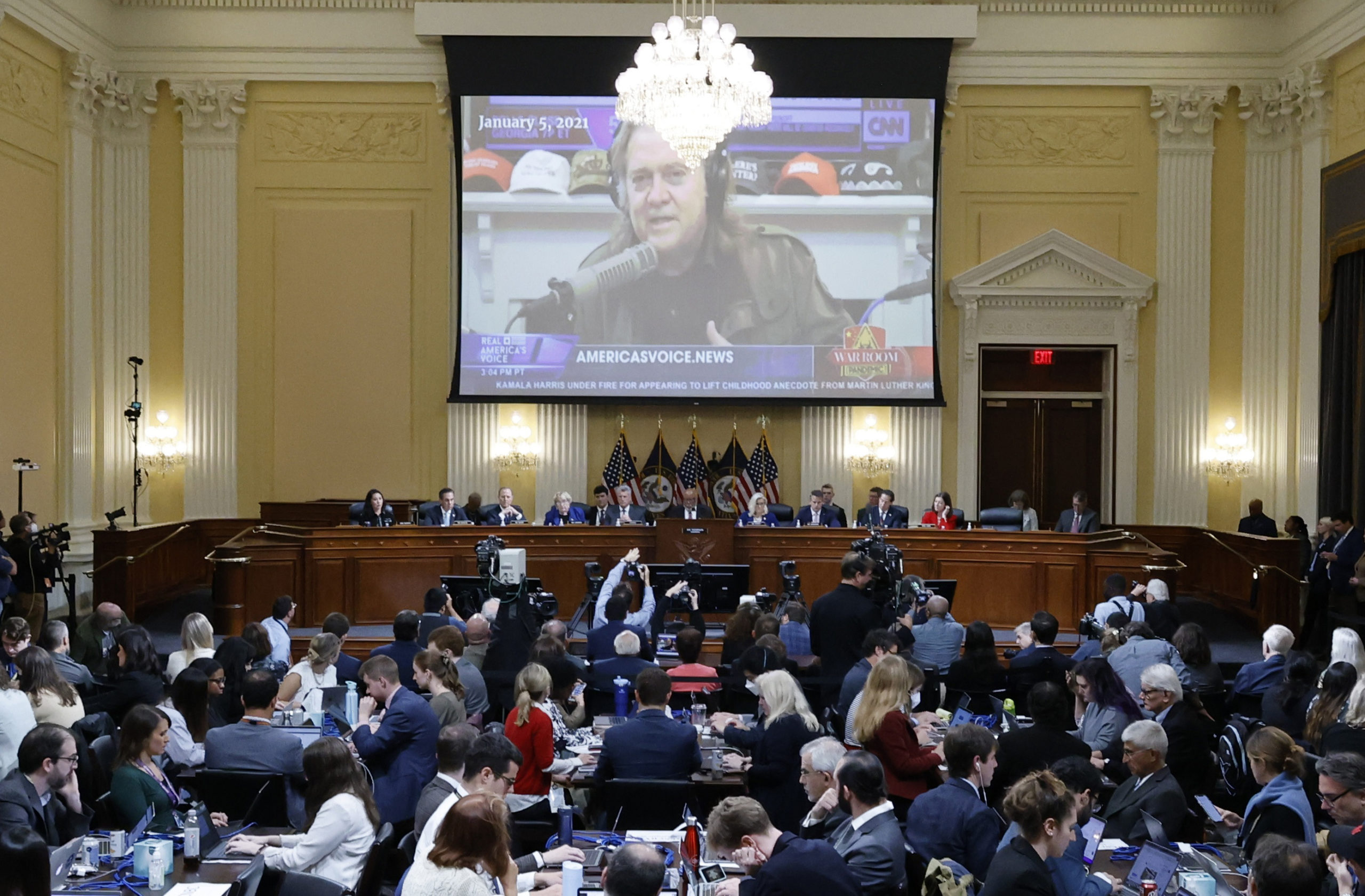 WASHINGTON, DC - OCTOBER 13: The U.S. House Select Committee to Investigate the January 6 Attack on the U.S. Capitol plays a video of former U.S. President Donald Trump's former White House political advisor Steve Bannon during a hearing on the January 6th investigation in the Cannon House Office Building on October 13, 2022 in Washington, DC. The bipartisan committee, in possibly its final hearing, has been gathering evidence for almost a year related to the January 6 attack at the U.S. Capitol.  On January 6, 2021, supporters of former President Donald Trump attacked the U.S. Capitol Building during an attempt to disrupt a congressional vote to confirm the electoral college win for President Joe Biden. (Photo by Jonathan Ernst-Pool/Getty Images)