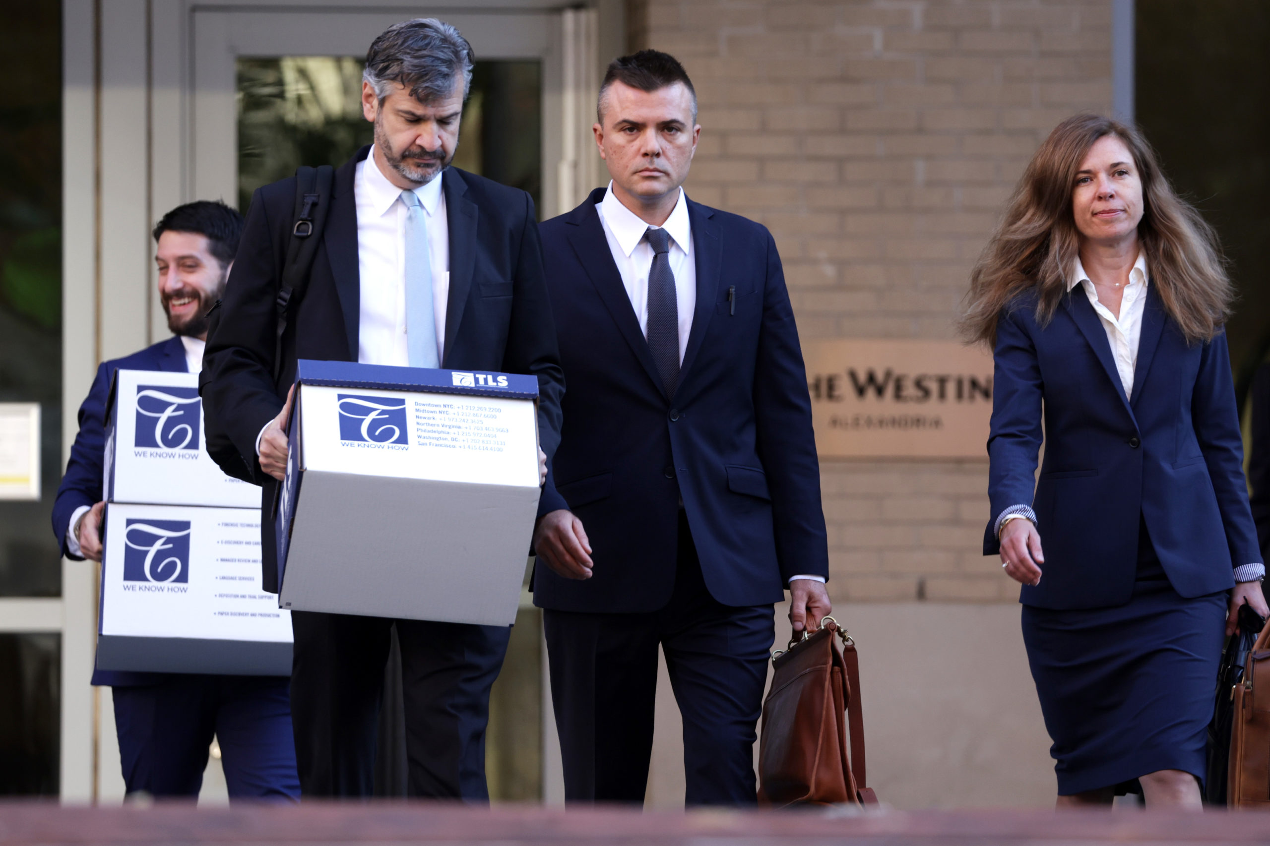 ALEXANDRIA, VIRGINIA - OCTOBER 11: Russian analyst Igor Danchenko (C) arrives at the Albert V. Bryan U.S. Courthouse for his trial on October 11, 2022 in Alexandria, Virginia. Danchenko faces five counts of lying to the FBI over his sources as to claims made in the “Christopher Steele Dossier” as part of the investigation of Special Counsel John Durham into the origins of the FBI probe of alleged collusion between Russia and the 2016 Trump presidential campaign. (Photo by Alex Wong/Getty Images)