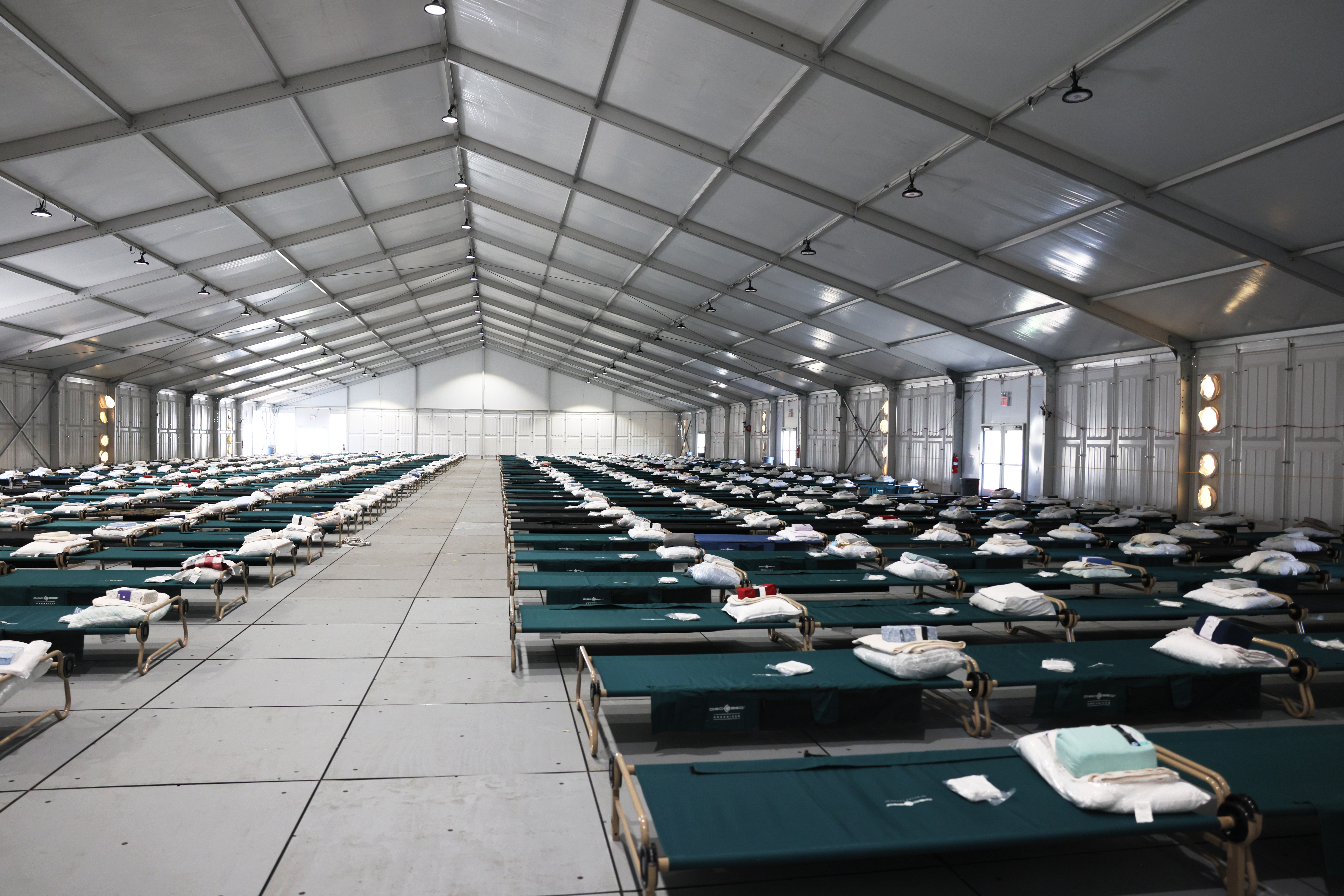 NEW YORK, NEW YORK - OCTOBER 18: Beds are seen in the dormitory during a tour of the Randall's Island Humanitarian Emergency Response and Relief Center on October 18, 2022 in New York City. Photo by Michael M. Santiago/Getty Images