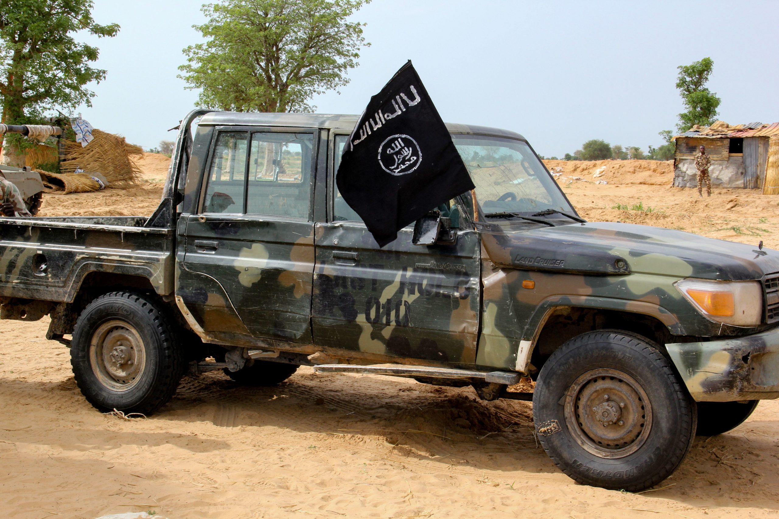 A vehicle allegedly belonging to the Islamic State group in West Africa (ISWAP) is seen in Baga on August 2, 2019. - Intense fighting between a regional force and the Islamic State group in West Africa (ISWAP) has resulted in dozens of deaths, including at least 25 soldiers and more than 40 jihadists, in northeastern Nigeria. ISWAP broke away from Boko Haram in 2016 in part due to its rejection of indiscriminate attacks on civilians. Last year the group witnessed a reported takeover by more hardline fighters who sidelined its leader and executed his deputy. The IS-affiliate has since July 2018 ratcheted up a campaign of attacks against military targets. 