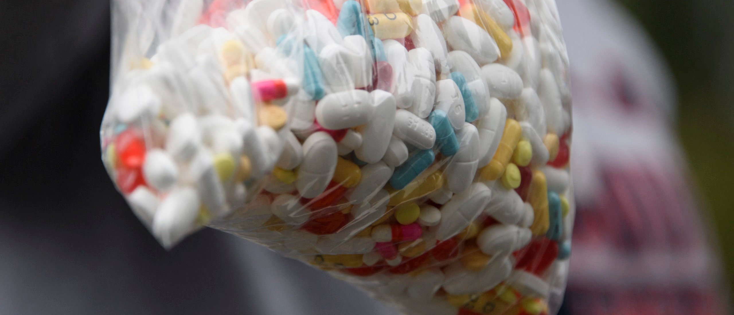 A bag of assorted pills and prescription drugs dropped off for disposal is displayed during the Drug Enforcement Administration (DEA) 20th National Prescription Drug Take Back Day at Watts Healthcare on April 24, 2021 in Los Angeles, California. (Photo by PATRICK T. FALLON/AFP via Getty Images)
