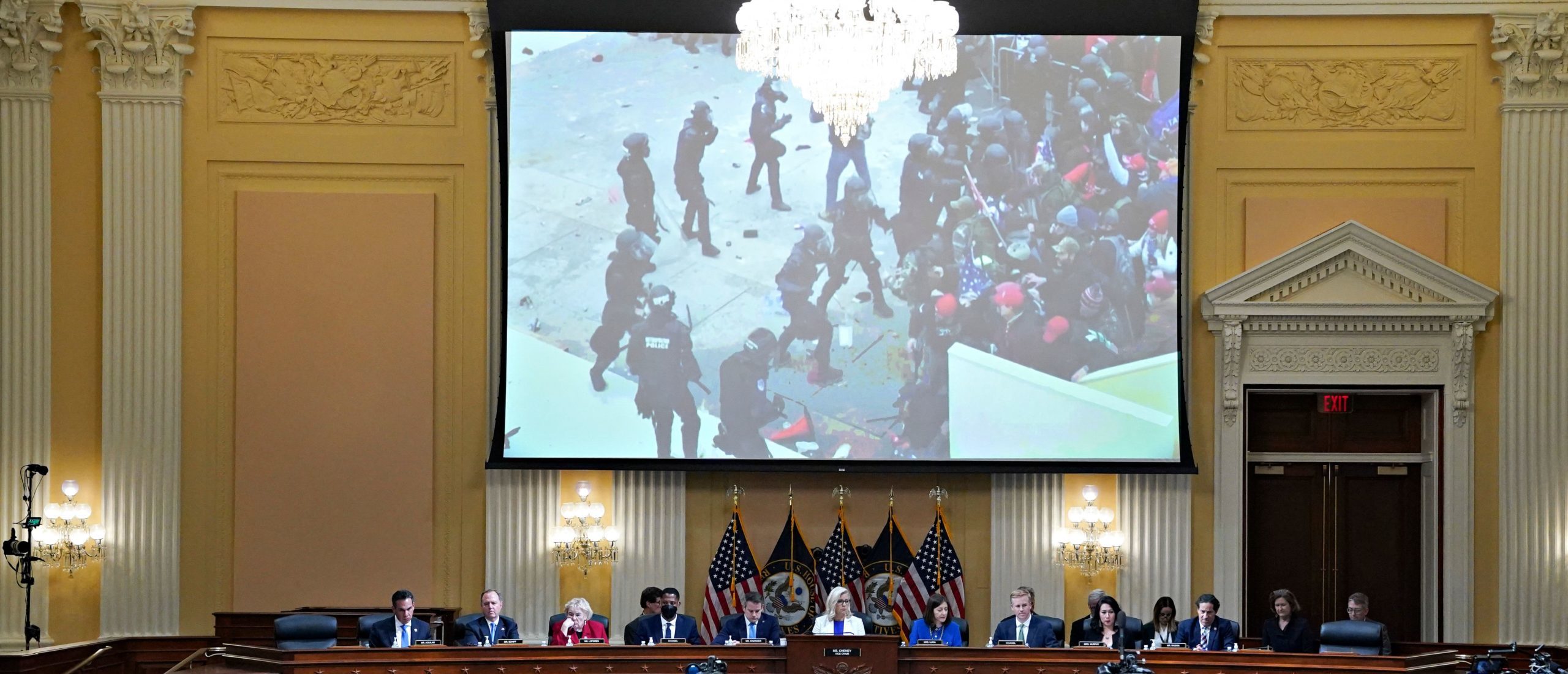 A video of Jan. 6 rioters outside the US Capitol is displayed on a screen during a hearing by the House Select Committee to investigate the January 6th attack on the US Capitol in the Cannon House Office Building in Washington, DC, on July 21, 2022.