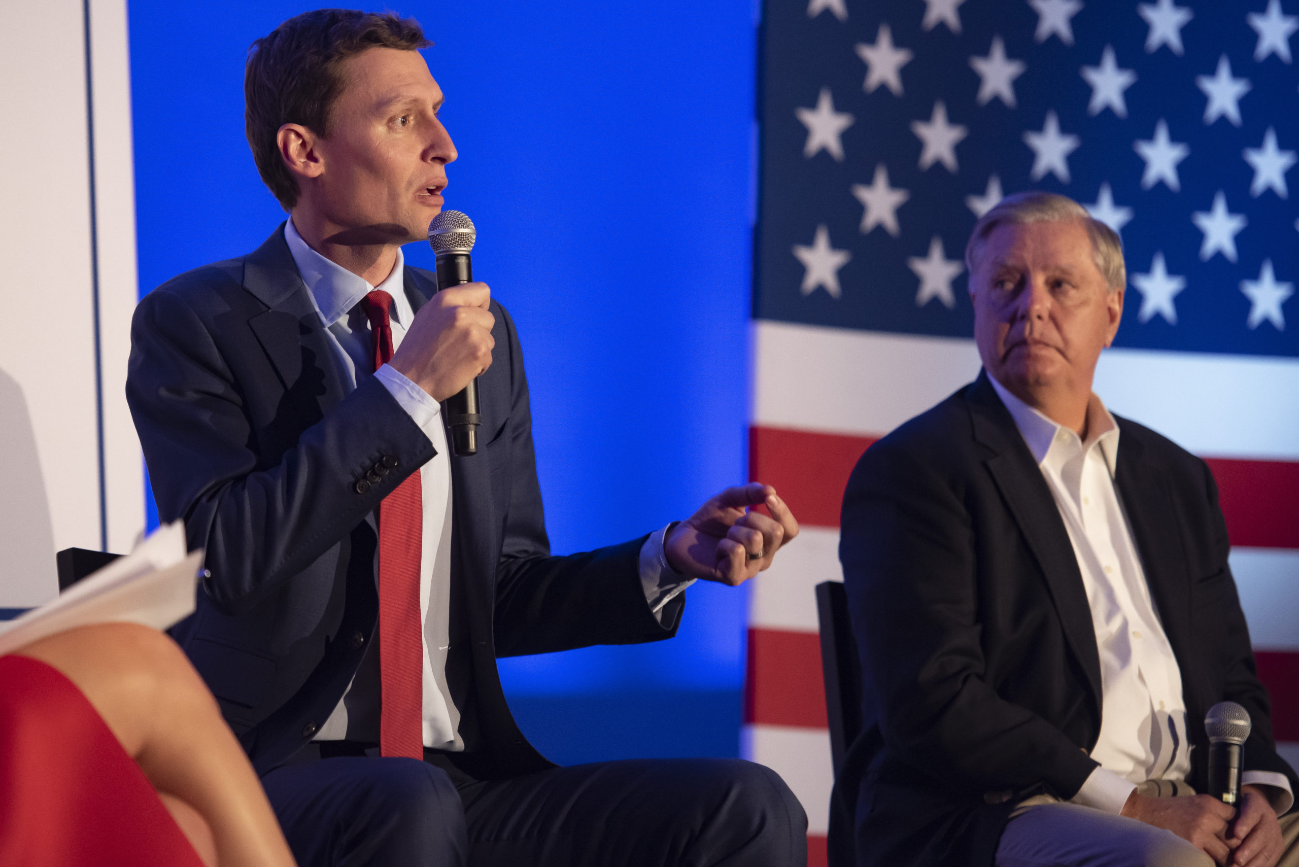SCOTTSDALE, AZ - OCTOBER 14: Republican candidate for U.S. Senate Blake Masters speaks as Sen. Lindsey Graham (R-SC) listens during the America the Great tour panel discussion hosted by Heritage Action for America at the Scottsdale Resort at McCormick Ranch on October 14, 2022 in Scottsdale, Arizona. (Photo by Rebecca Noble/Getty Images)