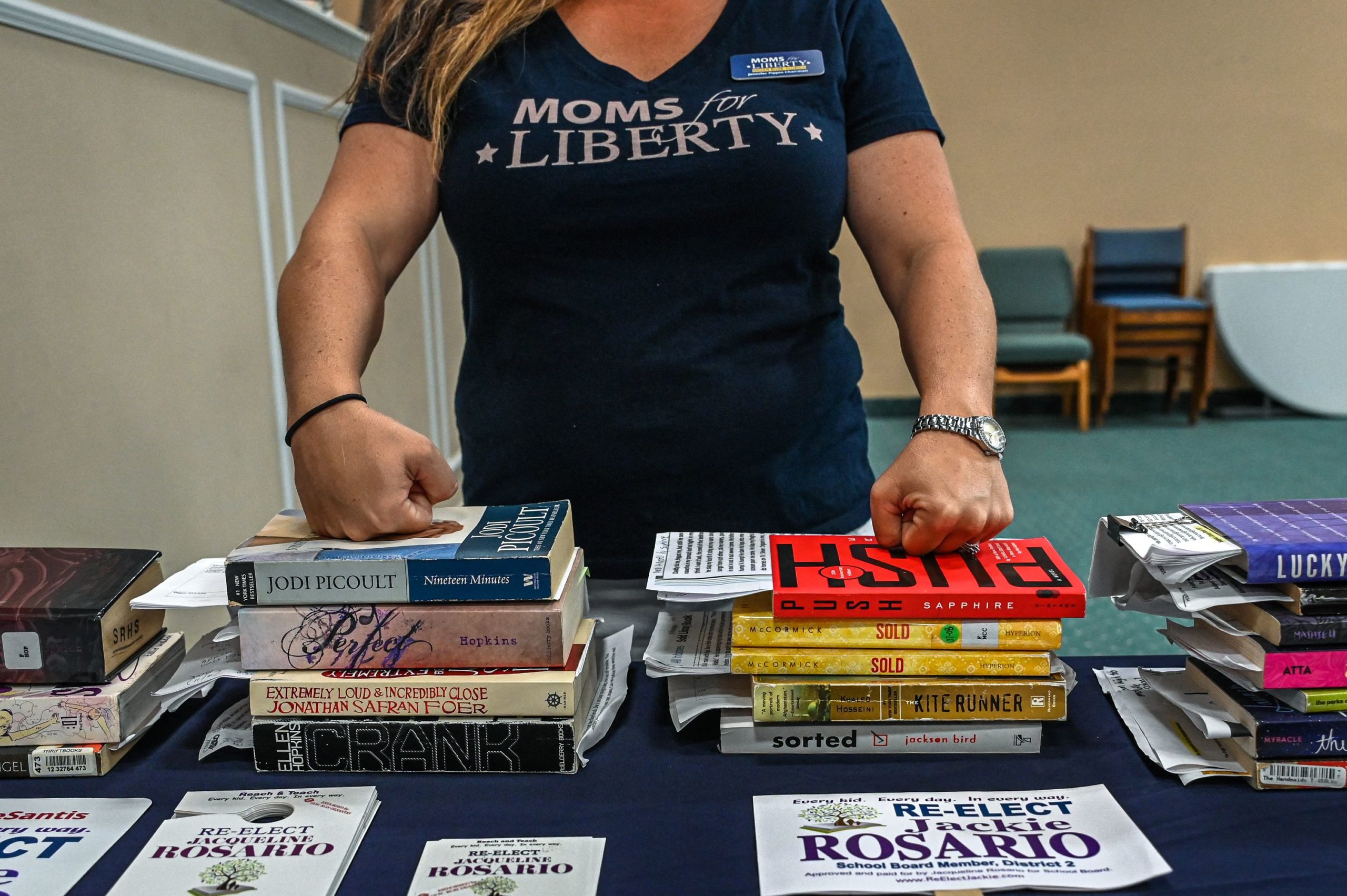 Jennifer Pippin, president of the Indian River County chapter of Moms for freedom, attends Jacqueline Rosario's campaign event in Vero Beach, Florida on October 16, 2022. - Rosario's candidacy for re-election to a school board is supported by the controversial group "Moms for Liberty", which claims to defend the "rights of parents" but is accused by its critics of opposing LGBT rights. Long dormant and apolitical institutions, these councils, whose members are elected, have become real powder kegs with the politicization of subjects such as the discussion of gender or sexuality in schools, or the teaching of racism. Education has been at the heart of some mid-term elections. (Photo by Giorgio VIERA / AFP) (Photo by GIORGIO VIERA/AFP via Getty Images)