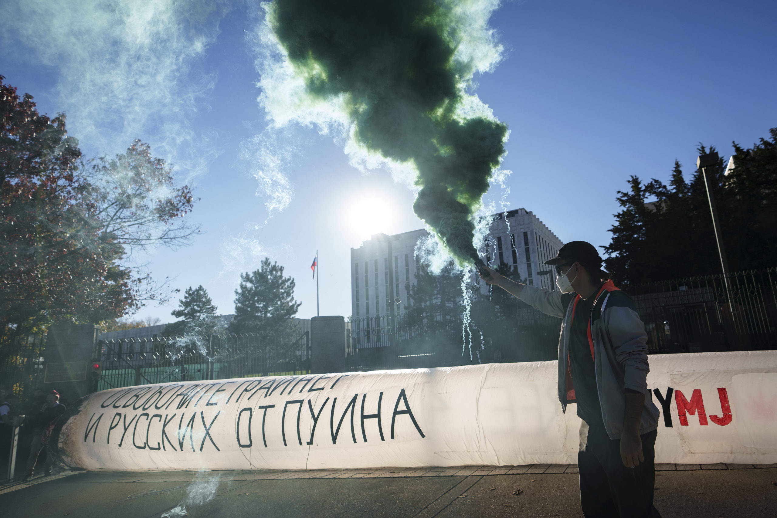 WASHINGTON, DC - OCTOBER 27: Cannabis advocates deploy green smoke and a fake inflatable joint outside the Russian Embassy to demand the release of American basketball star Brittney Griner, who has been imprisoned in Russia since February for cannabis possession, October 27, 2022 in Washington, DC. Earlier this week, a Russian appeals court upheld a nine-year prison sentence imposed on Griner. According to the Biden administration, Russia and the United States have been in frequent contact about a potential prisoner exchange involving Griner and others. 