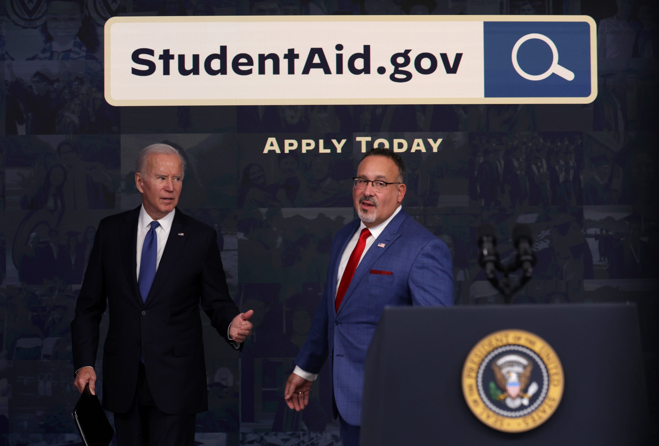 U.S. President Joe Biden and Secretary of Education Miguel Cardona (R) leave after Biden spoke on the student debt relief at the South Court Auditorium at Eisenhower Executive Office Building on October 17, 2022 in Washington, DC. President Biden gave an update on student debt relief portal beta test. (Photo by Alex Wong/Getty Images)