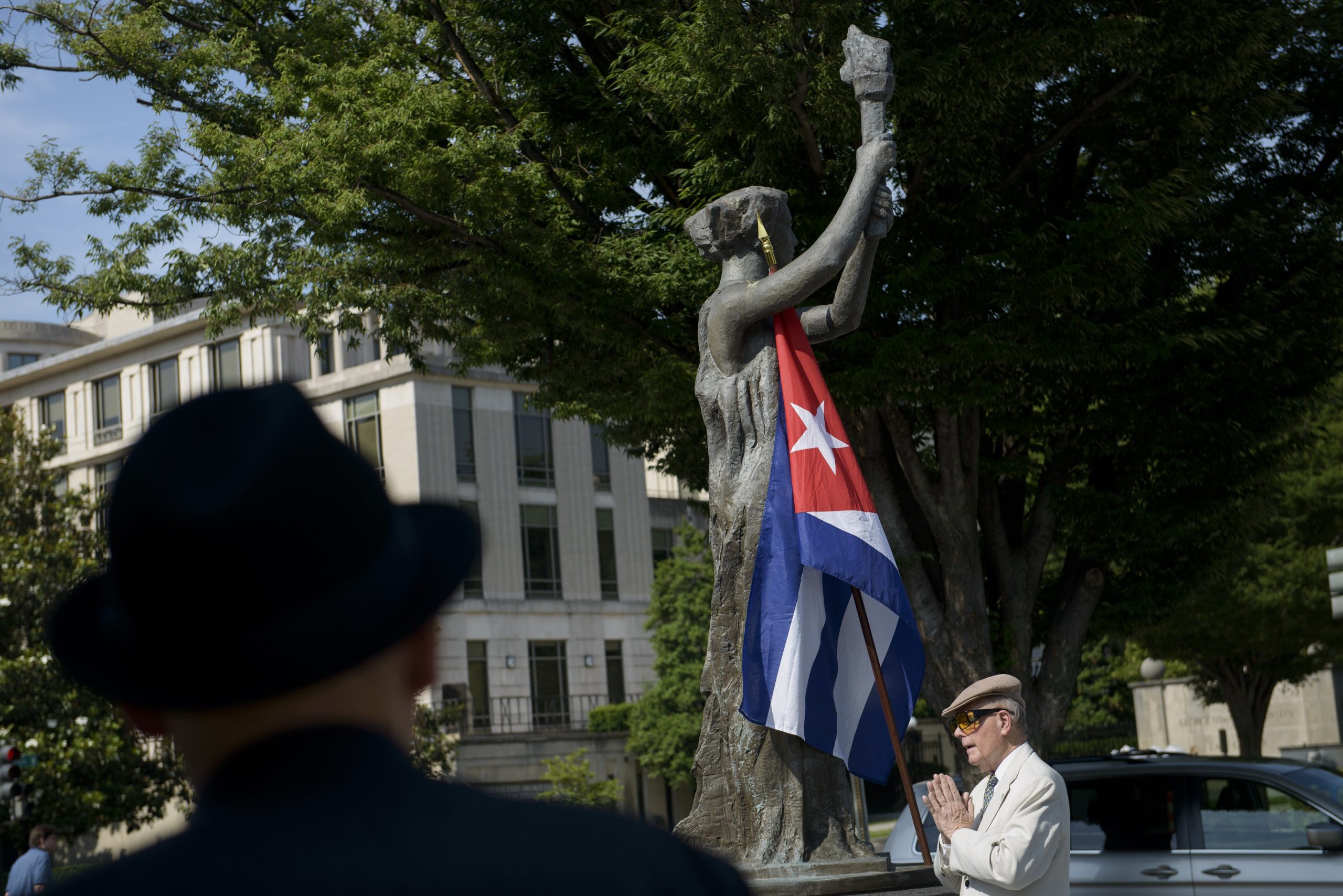 The Cuban flag is seen as people arrive for an event at the Victims of Communism Memorial June 12, 2015 in Washington, DC. AFP PHOTO/BRENDAN SMIALOWSKI (Photo credit should read BRENDAN SMIALOWSKI/AFP via Getty Images)