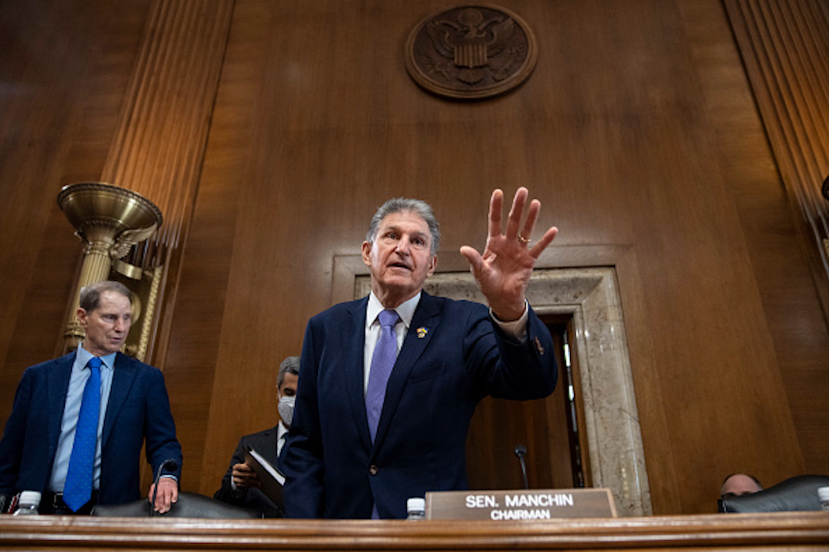 WASHINGTON, DC - SEPTEMBER 29: Sen. Joe Manchin (D-WV) arrives for a Senate Committee on Energy and Natural Resources hearing on Capitol Hill on September 29, 2022 in Washington, DC. Earlier this week, Manchin announced that he would move forward on government funding legislation without his signature energy permitting reforms included. (Photo by Drew Angerer/Getty Images)