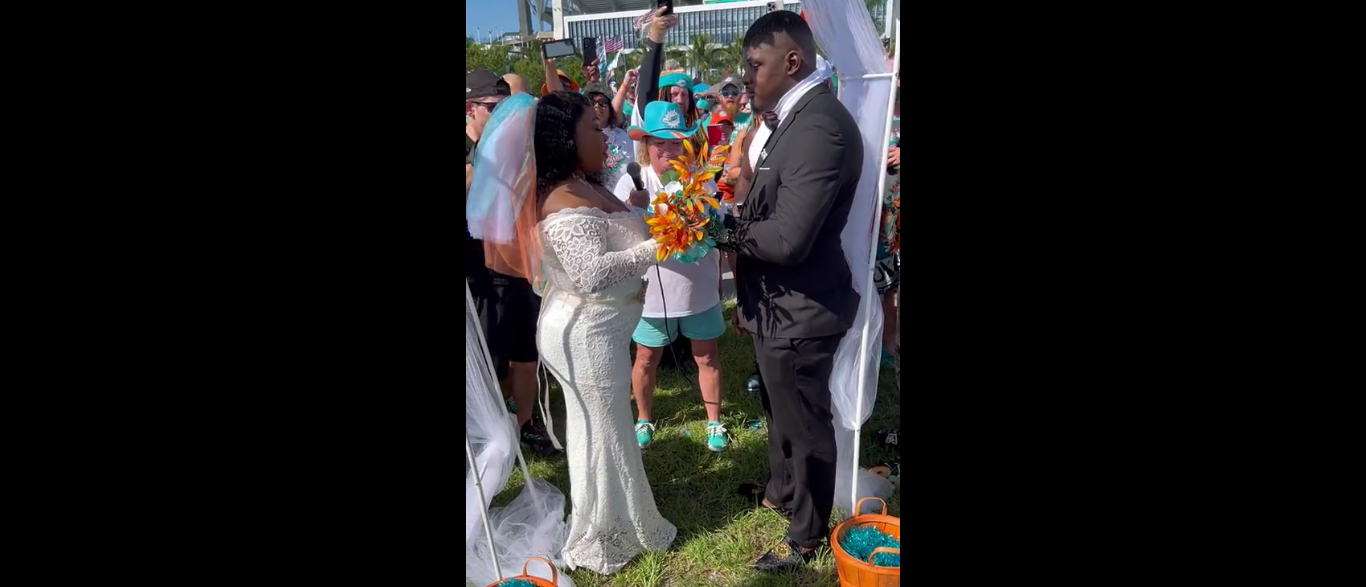 Diehard Cleveland Browns fans tie the knot while tailgating