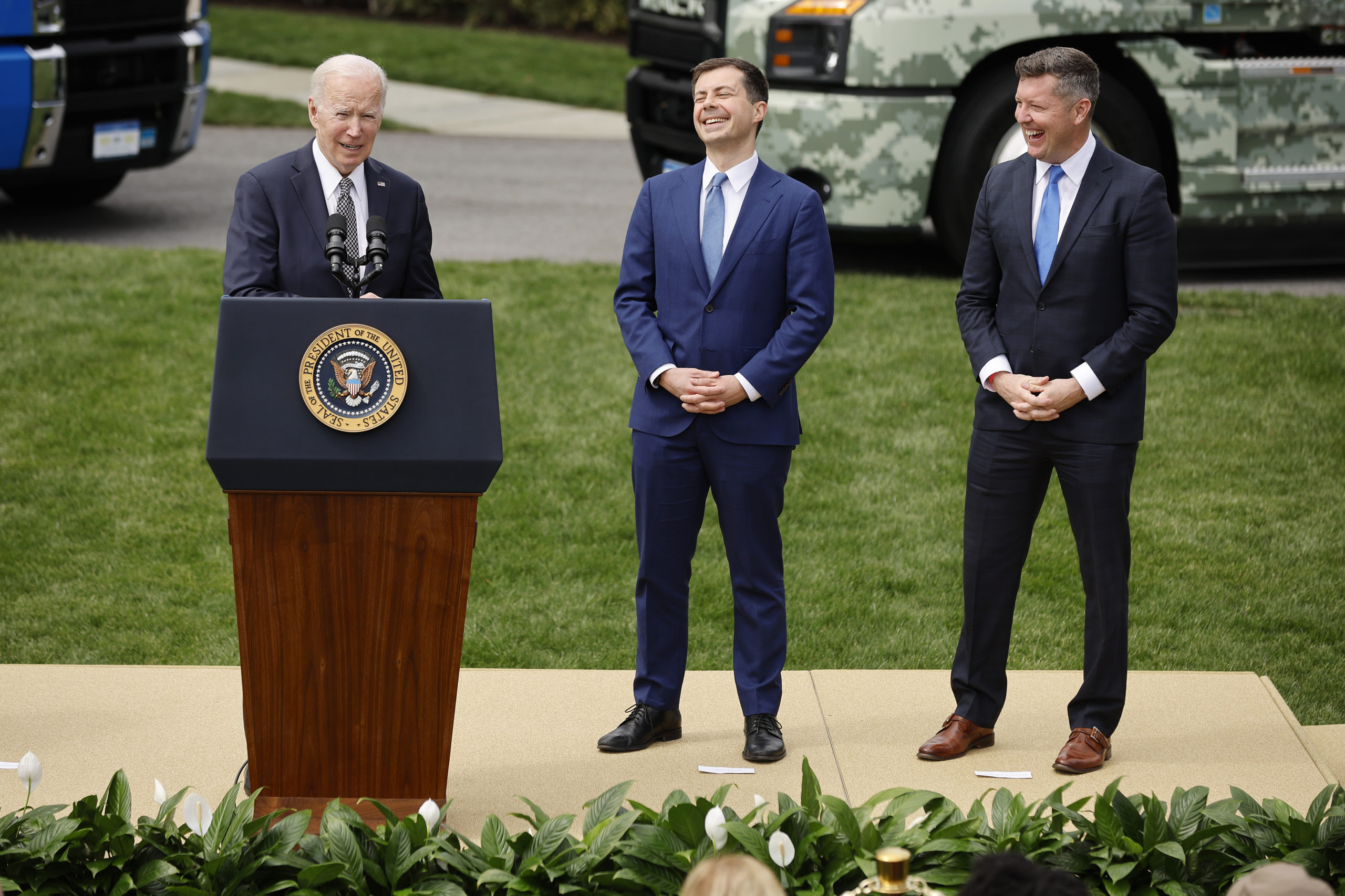 WASHINGTON, DC - APRIL 04: U.S. President Joe Biden (L) delivers remarks on his 'Trucking Action Plan' with Transportation Secretary Pete Buttigieg and Veterans Trucking Task Force Chair Patrick Murphy (R) on the South Lawn of the White House on April 04, 2022 in Washington, DC. Chip Somodevilla/Getty Images