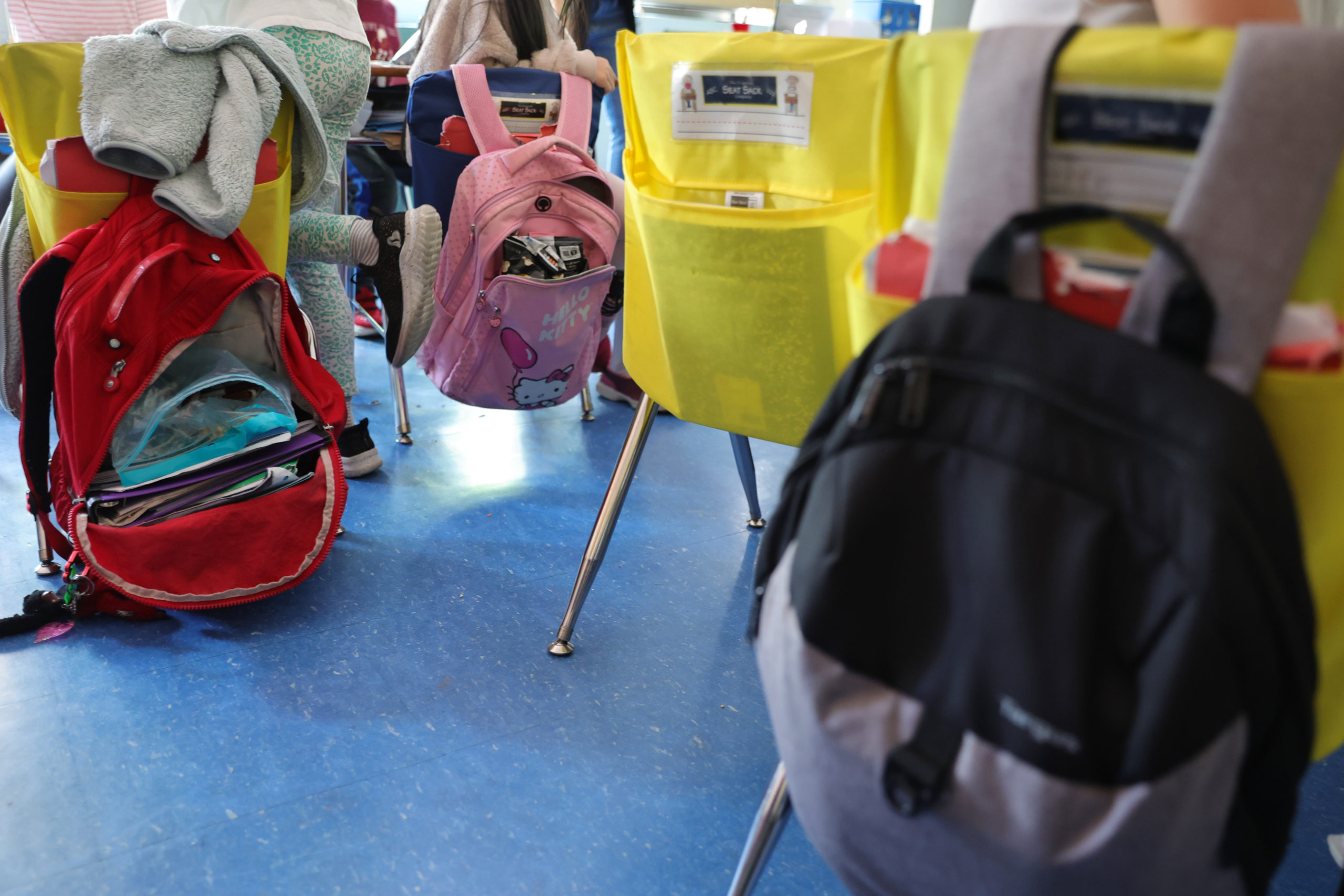 Student backpacks hang on the backs of classroom chairs on the second to last day of school as New York City public schools prepare to wrap up the year at Yung Wing School P.S. 124 on June 24, 2022 in New York City. Approximately 75% of NYC public schools enrolled fewer students for the 2021/2022 school year due to the pandemic. (Photo by Michael Loccisano/Getty Images)