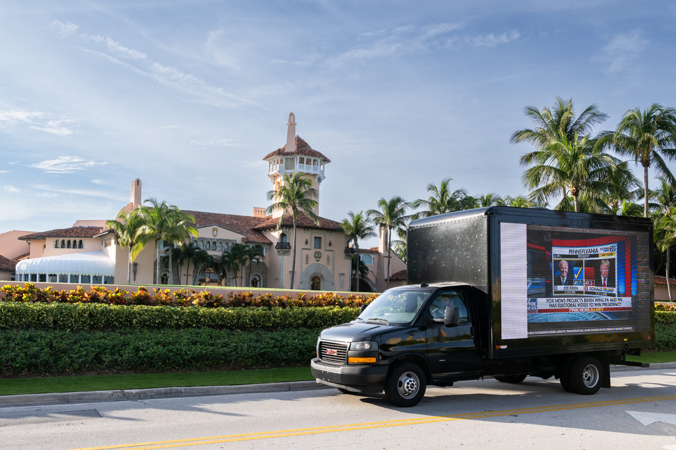 WEST PALM BEACH, FLORIDA - NOVEMBER 15: DNC welcomes Donald Trump to the 2024 GOP Primary by driving a mobile billboard around Mar-A-Lago on November 15, 2022 in Palm Beach, Florida. (Photo by Jason Koerner/Getty Images for DNC)
