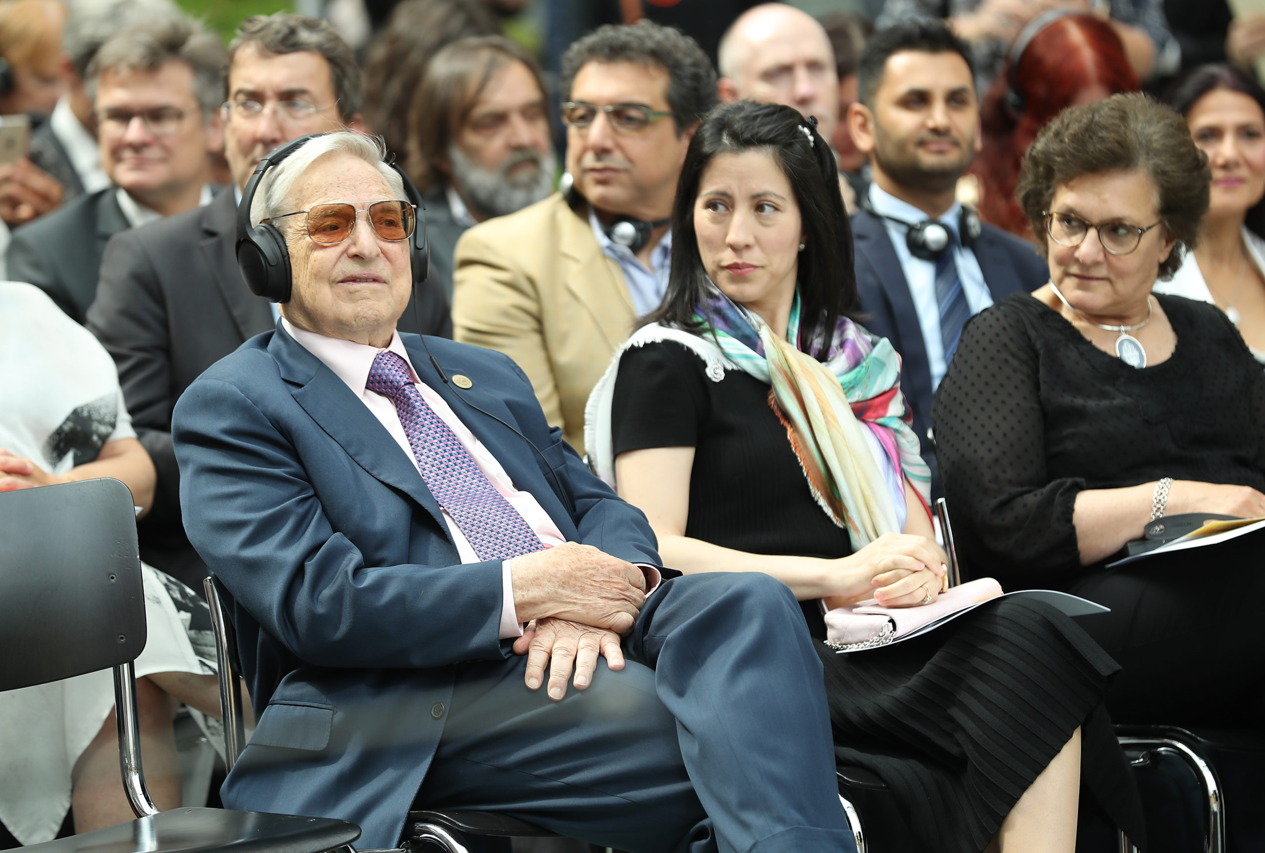 BERLIN, GERMANY - JUNE 08: Financier and philanthropist George Soros (L) and his wife Tamiko Bolton (C) attend the official opening of the European Roma Institute for Arts and Culture (ERIAC) at the German Foreign Ministry on June 8, 2017 in Berlin, Germany. Sean Gallup/Getty Images