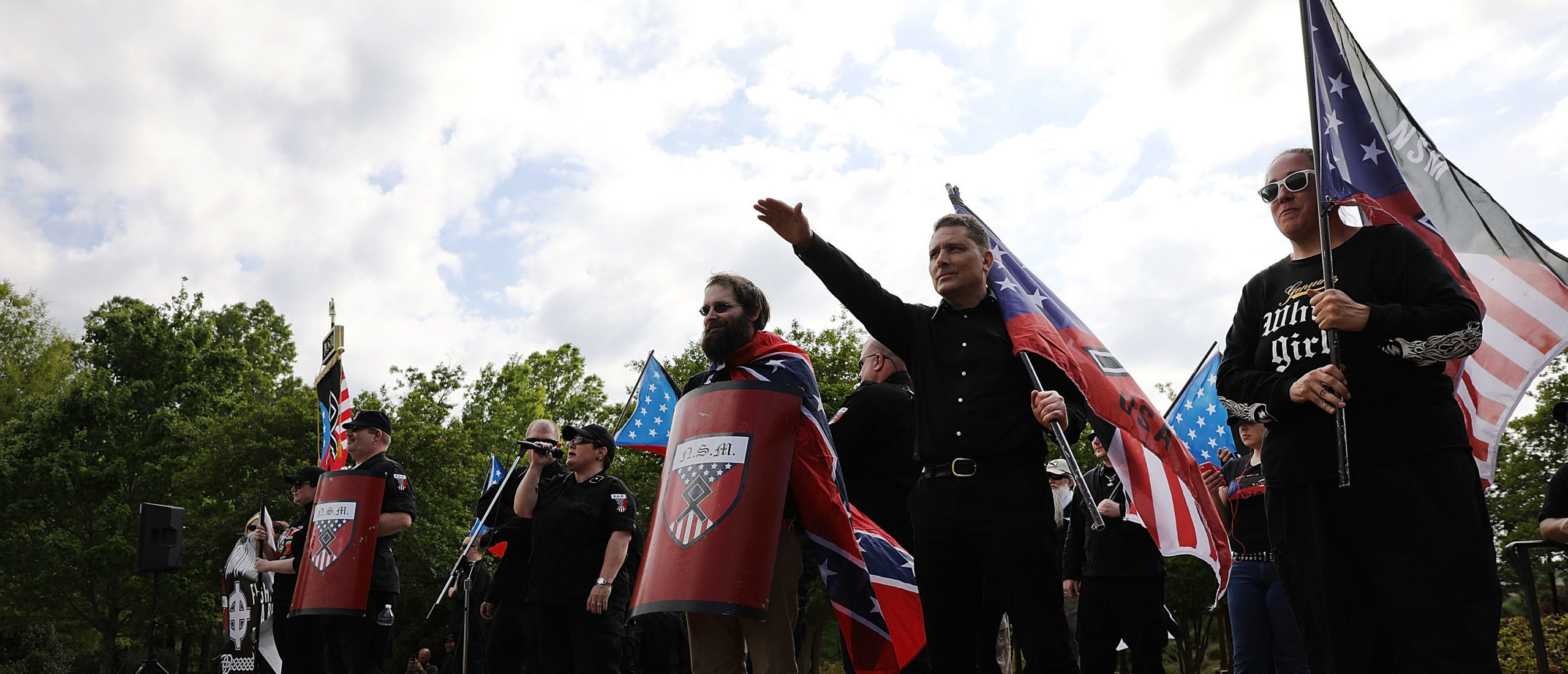 NEWNAN, GA - APRIL 21: Members and supporters of the National Socialist Movement, one of the largest neo-Nazi groups in the US, hold a rally on April 21, 2018 in Newnan, Georgia. Community members have opposed the rally and have come out to embrace racial unity in the small Georgia town. Fearing a repeat of the violence that broke out after Charlottesville, hundreds of police officers are stationed in the town during the rally in an attempt to keep the anti racist protesters and neo-Nazi groups separated. (Photo by Spencer Platt/Getty Images)