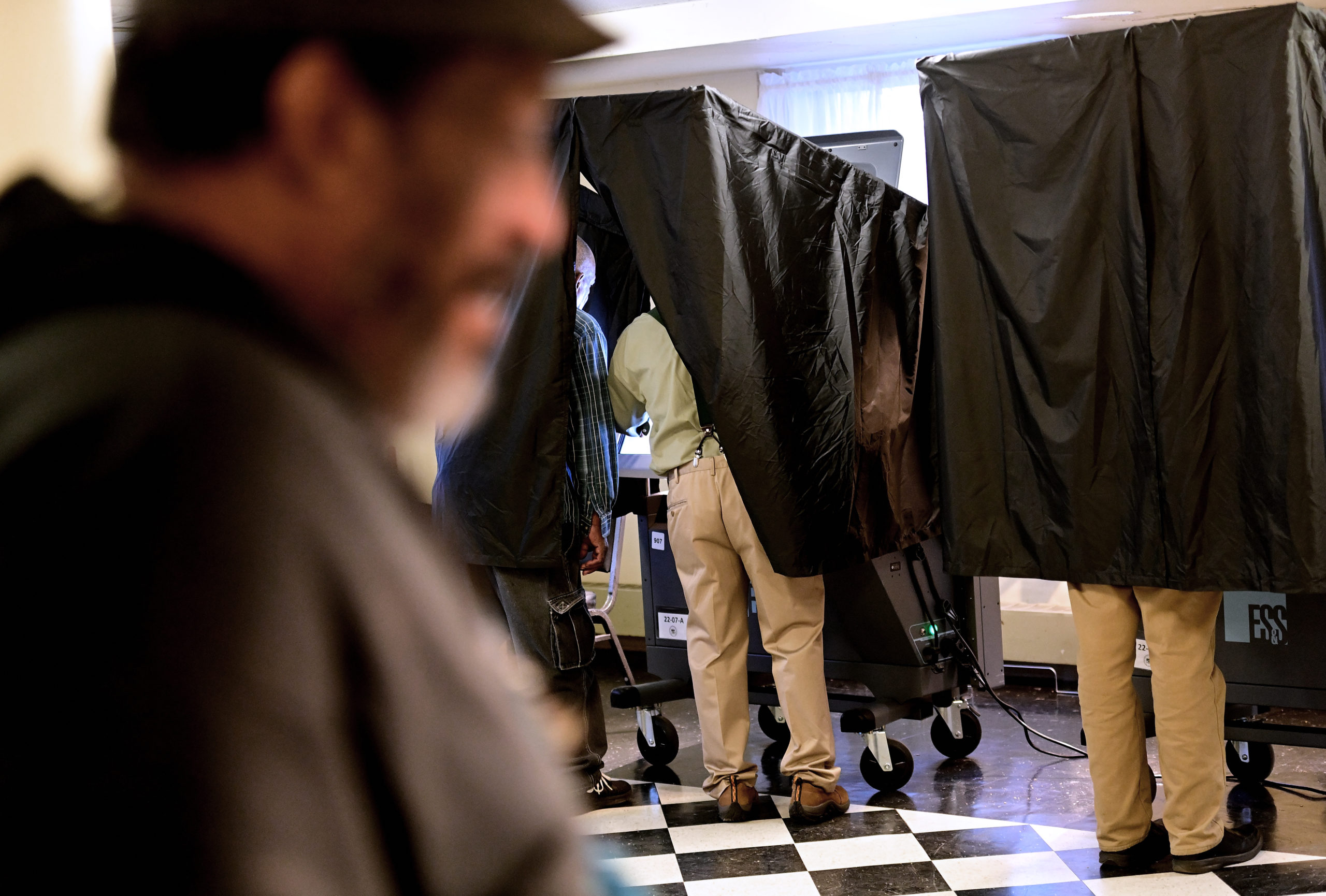 Voters cast their ballots at the Kendell Arms polling location on November 8, 2022 in Philadelphia, Pennsylvania.