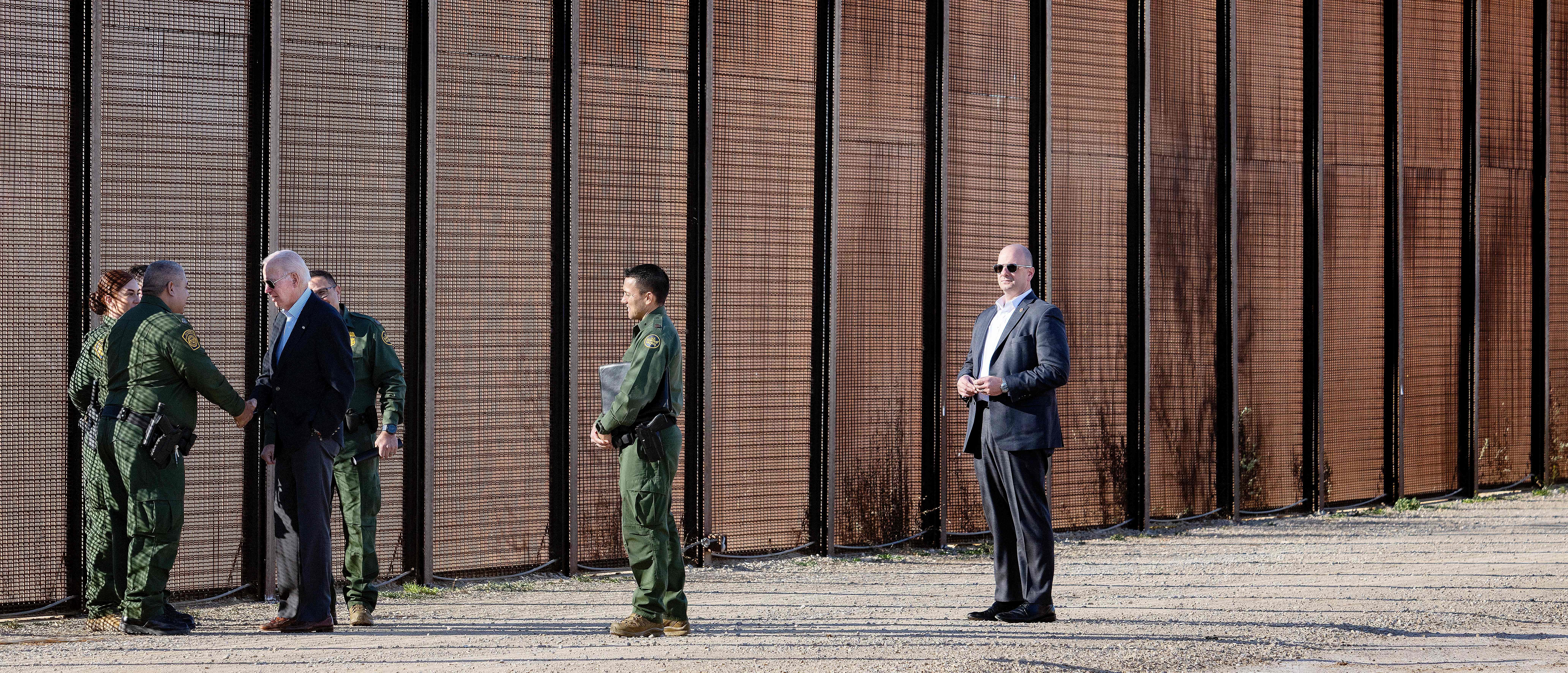 US President Joe Biden speaks with US Customs and Border Protection officers as he visits the US-Mexico border in El Paso, Texas, on January 8, 2023. (Photo by Jim WATSON / AFP) (Photo by JIM WATSON/AFP via Getty Images)