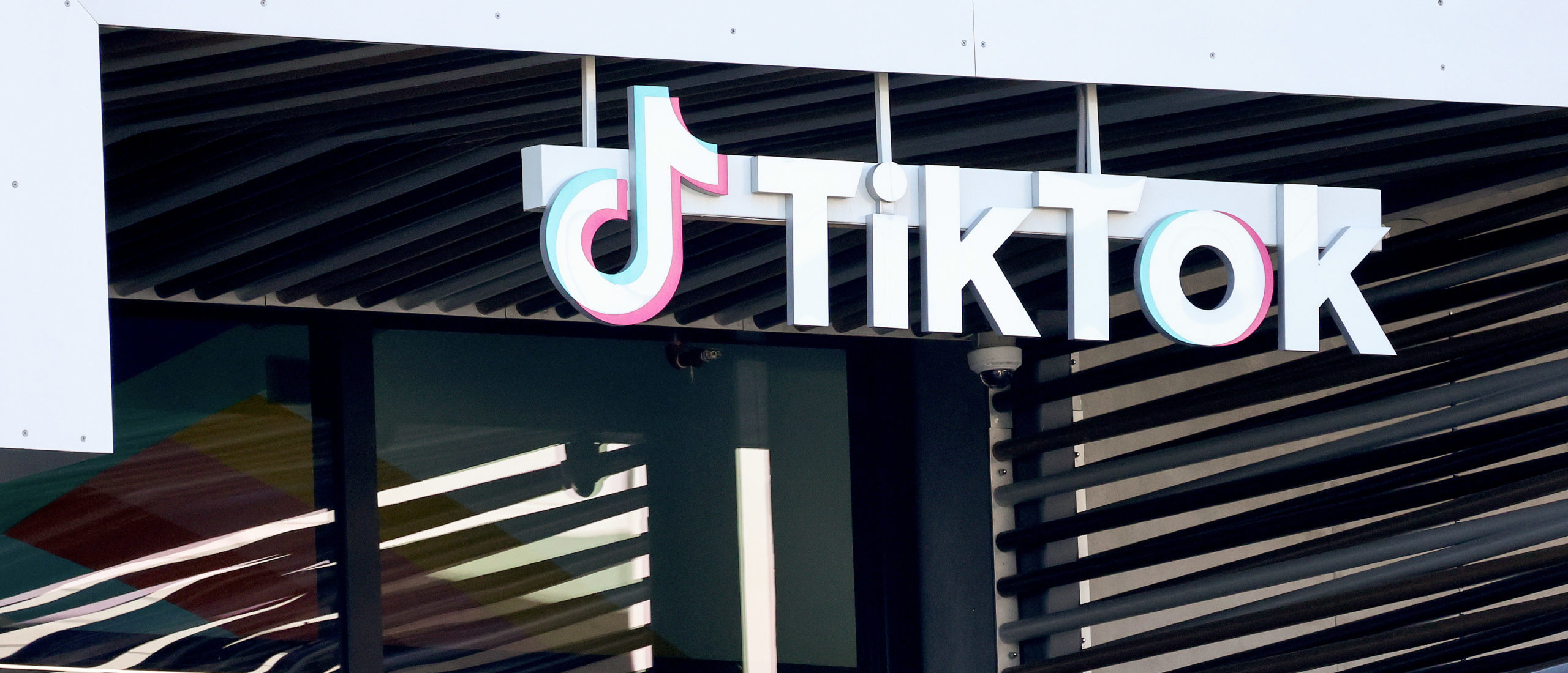 CULVER CITY, CALIFORNIA - DECEMBER 20: The TikTok logo is displayed at a TikTok office on December 20, 2022 in Culver City, California. Congress is pushing legislation to ban the popular Chinese-owned social media app from most government devices.