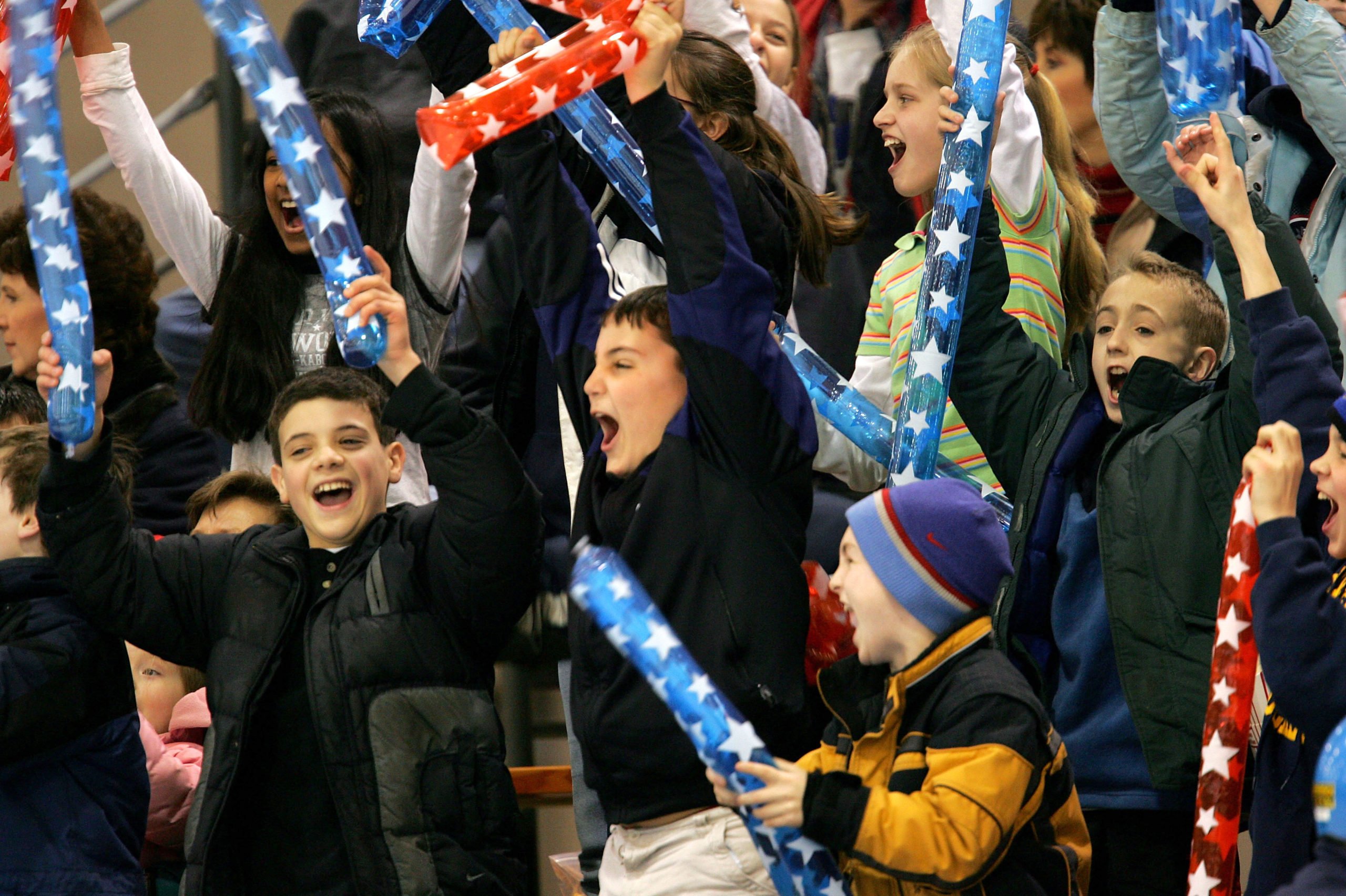 Elementary school kids cheer during the US Nationals Short Track Speed Skating Championships on February 24, 2005 at the Pettit National Ice Center in Milwaukee, Wisconsin. (Photo By Jamie Squire/Getty Images)