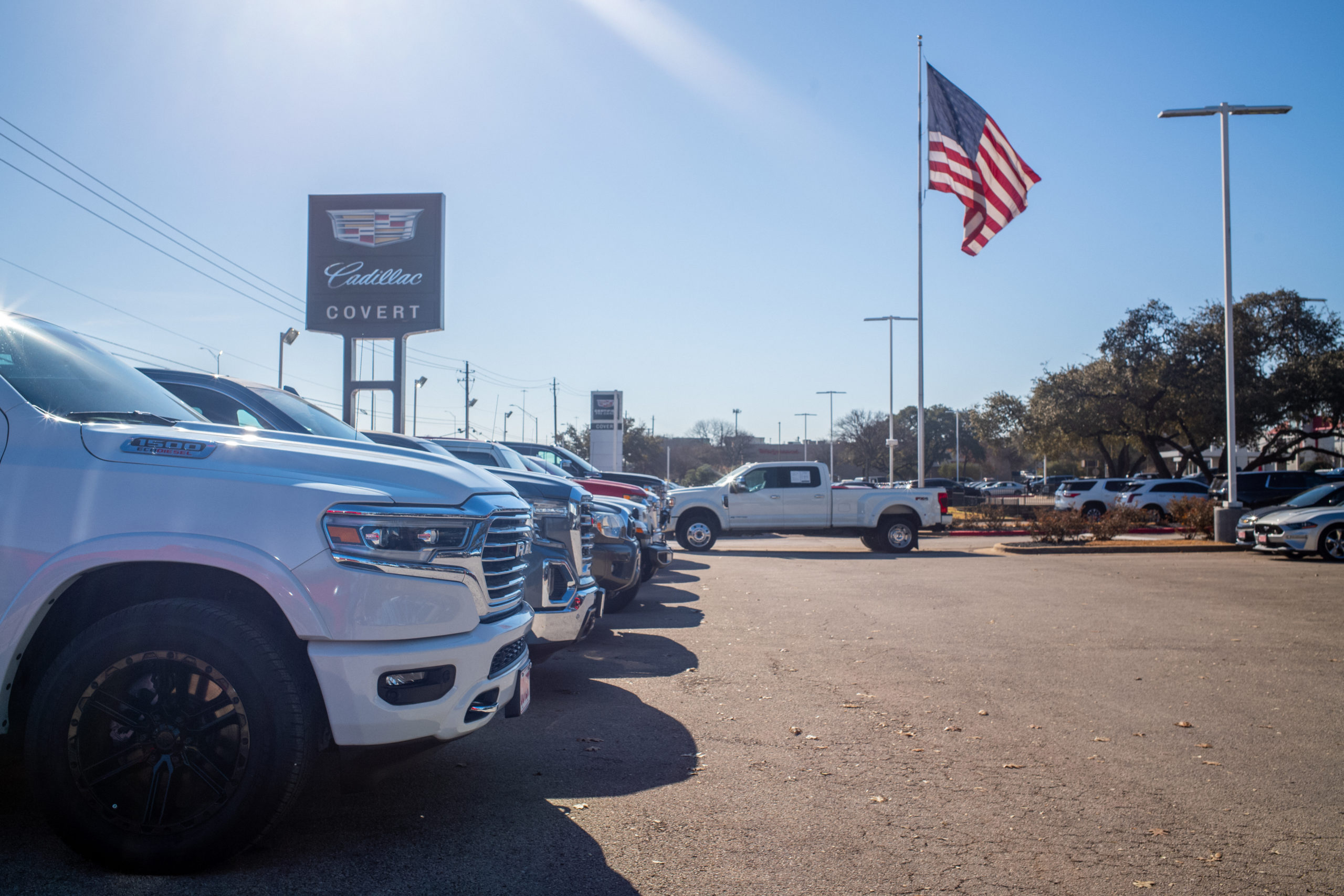 AUSTIN, TEXAS - JANUARY 05: GMC pickup trucks are displayed for sale on a lot at a General Motors dealership on January 05, 2023 in Austin, Texas. General Motors has reclaimed its title as the top-selling carmaker in the U.S. after outselling Toyota in 2022. GM reported that the company sold approximately 2.7 million vehicles last year, while Toyota came in just over 2.1 million vehicles sold. (Photo by Brandon Bell/Getty Images)